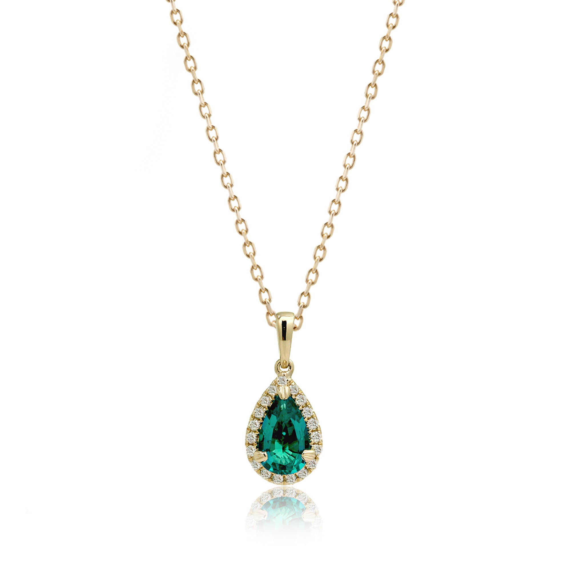 Pear green emerald pendant with diamond halo yellow gold