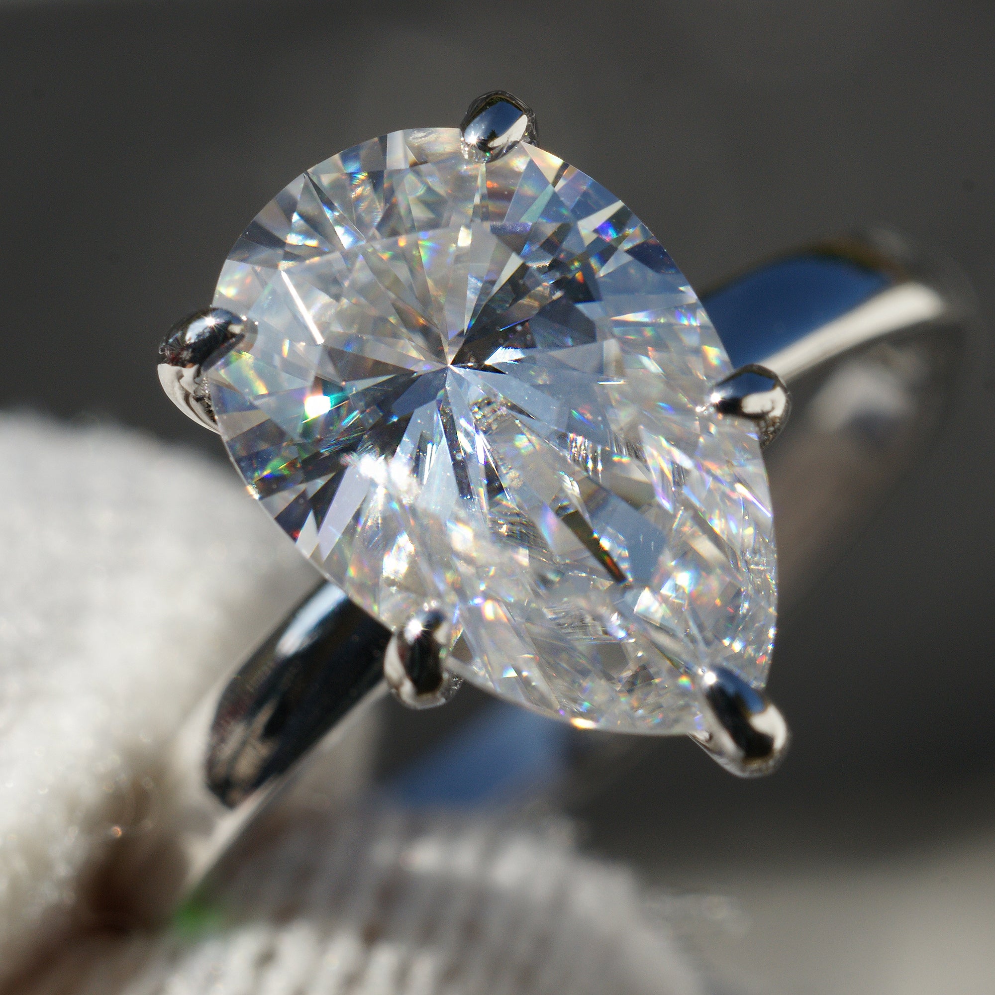 Solitaire moissanite engagement ring pear 3ct white gold