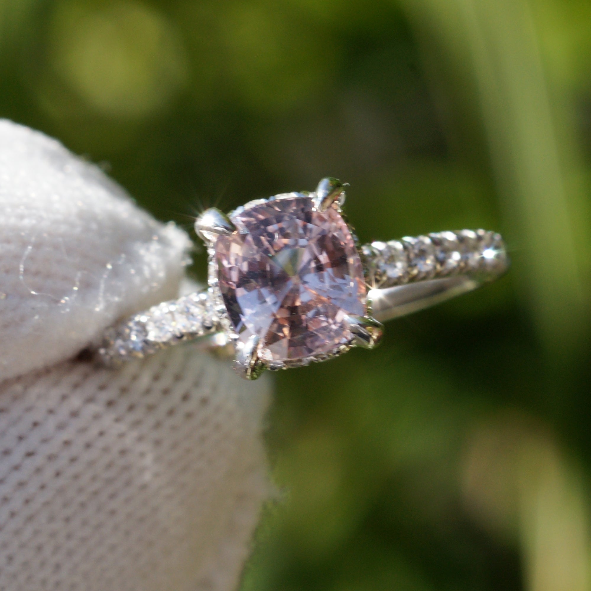 Light pink ceylon sapphire diamond engagement ring with hidden halo in white gold