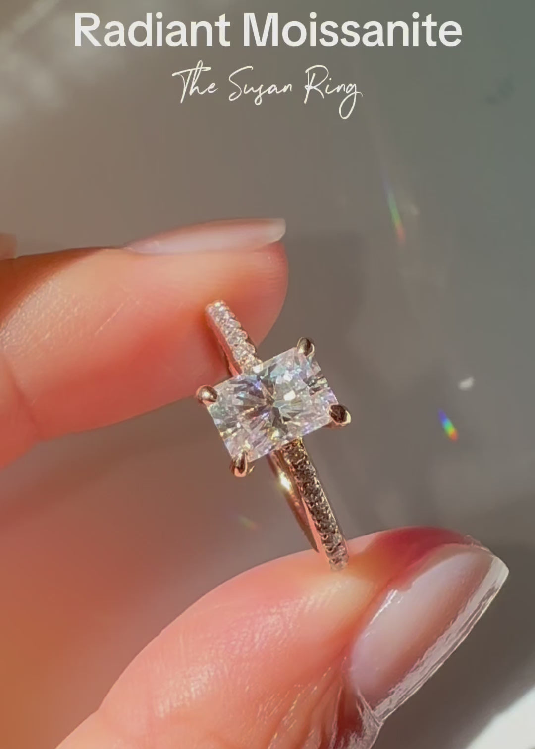 Radiant cut moissanite ring in rose gold with diamond accent on band