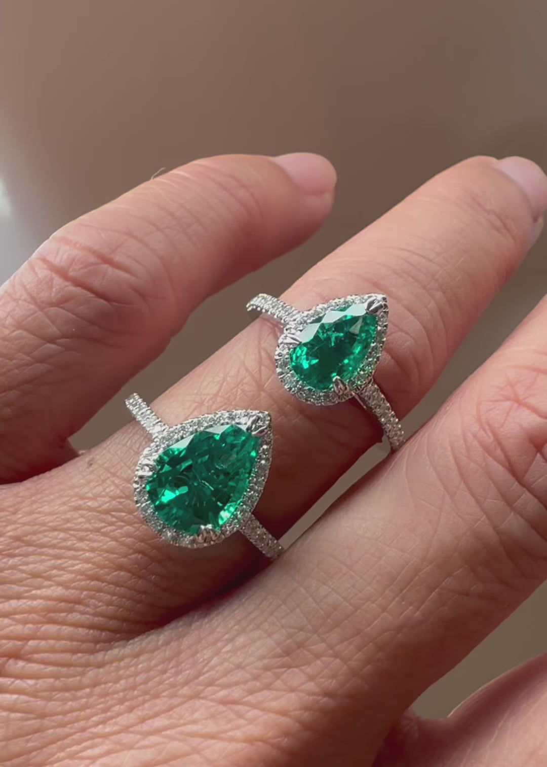 Pear emerald 5x8mm vs 7x10mm diamond halo setting