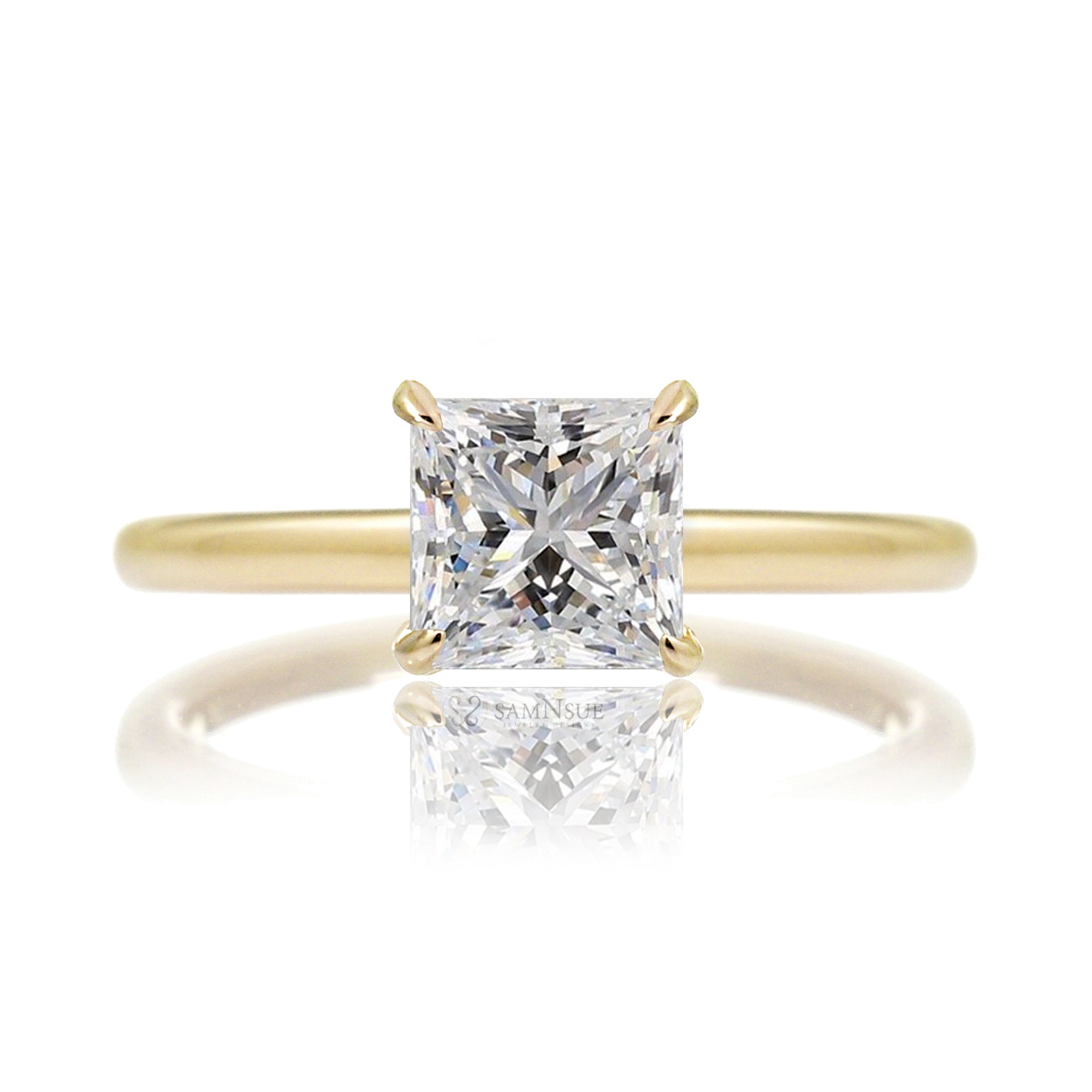 Princess cut solitaire diamond engagement ring with a hidden halo and solid polished band in yellow gold