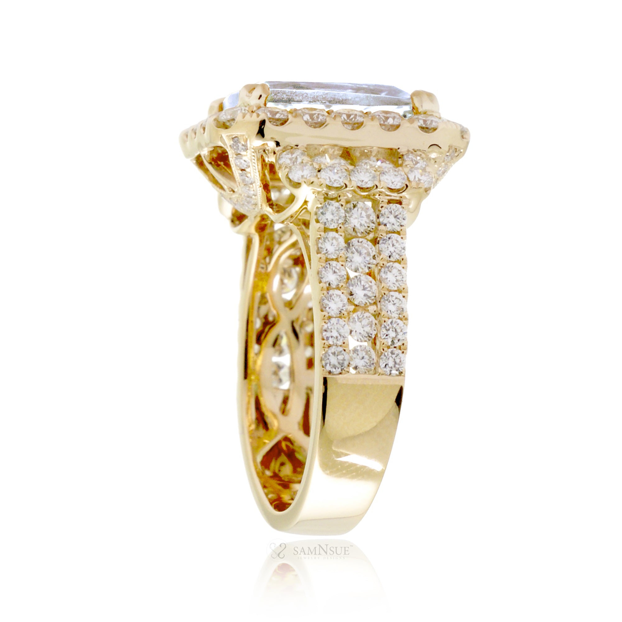 Bold Emerald Cut Diamond Halo Ring in Yellow Gold