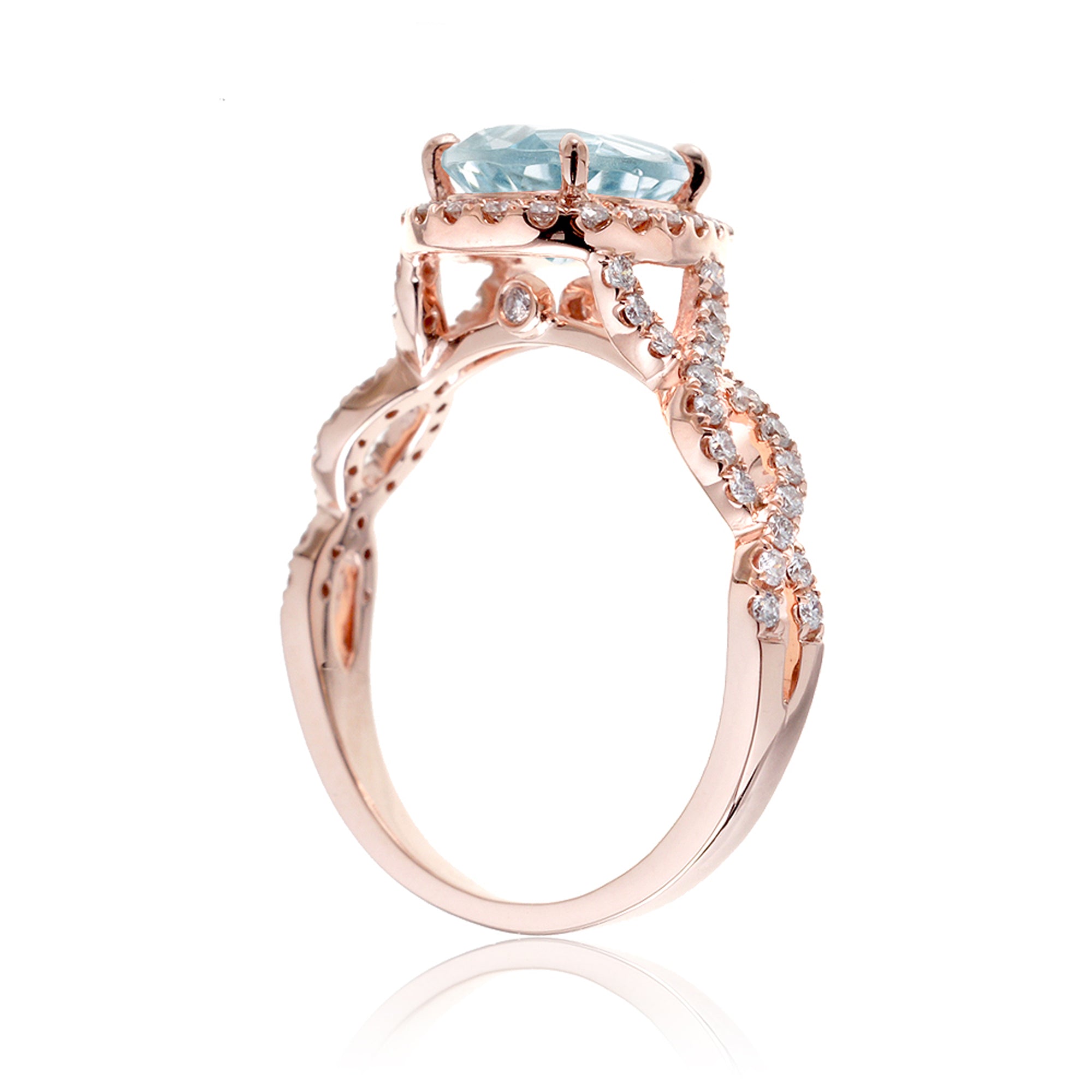 Pear aquamarine gemstone ring diamond halo twisted band rose gold