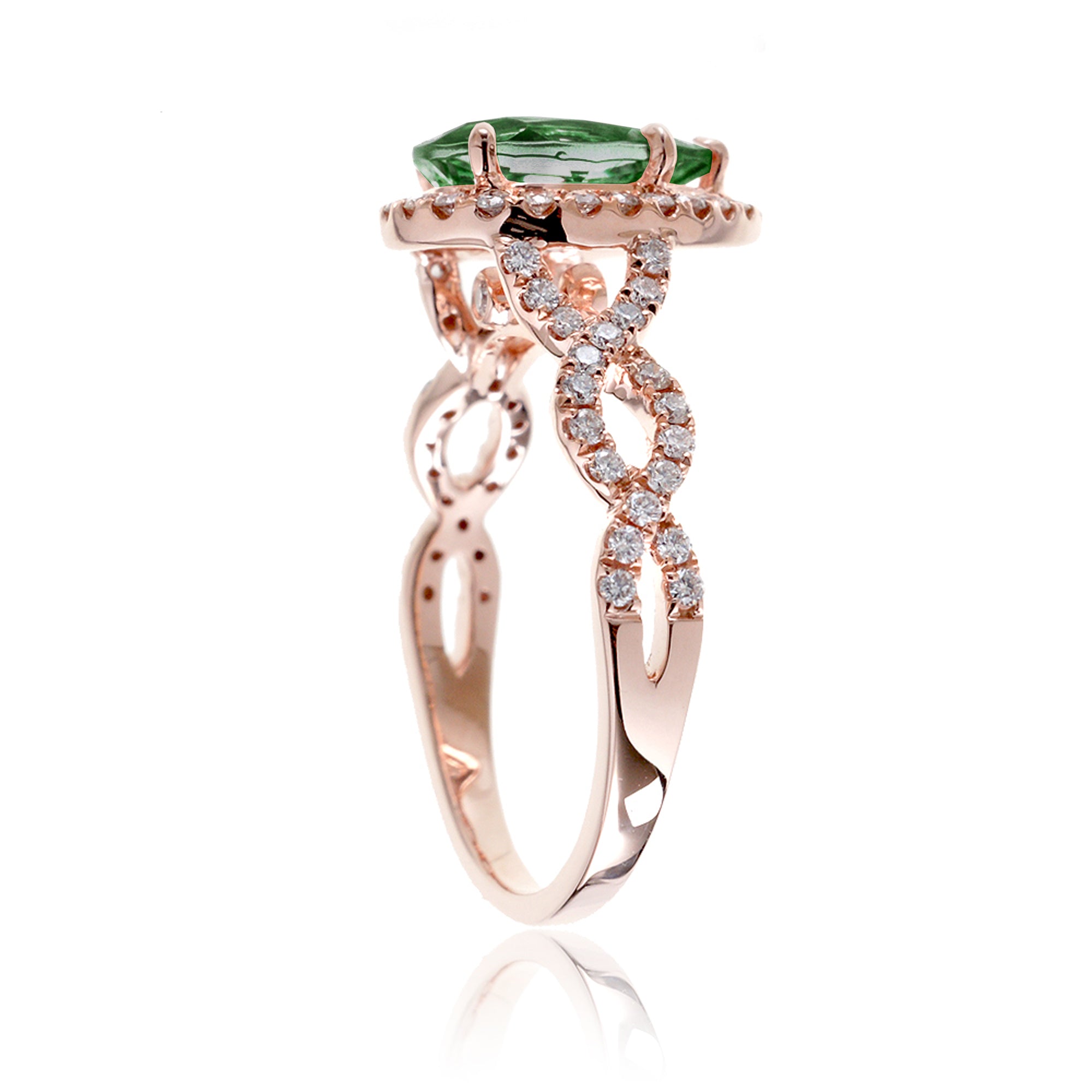 pear emerald diamond halo ring with twisted band rose gold