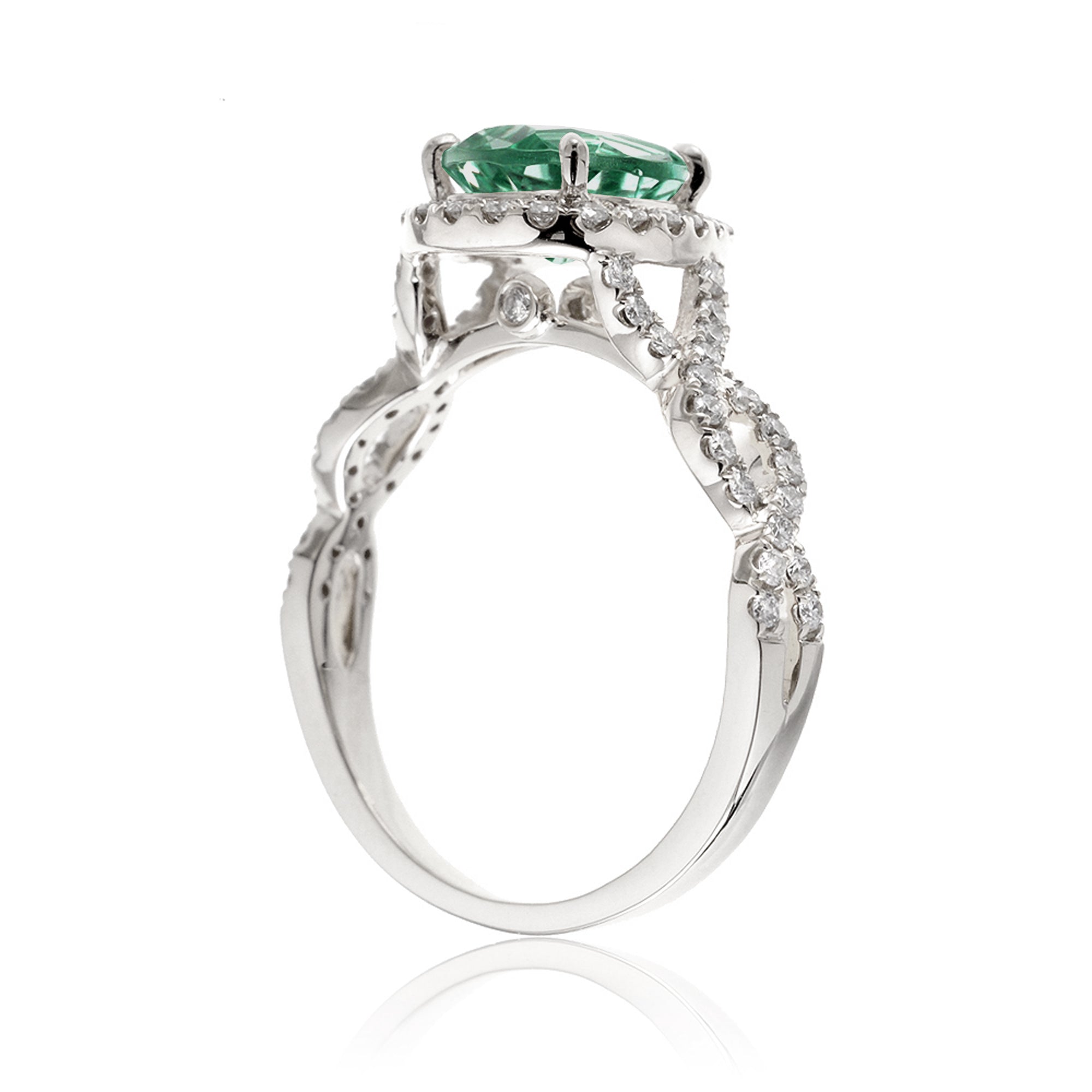 pear emerald diamond halo ring with twisted band white gold