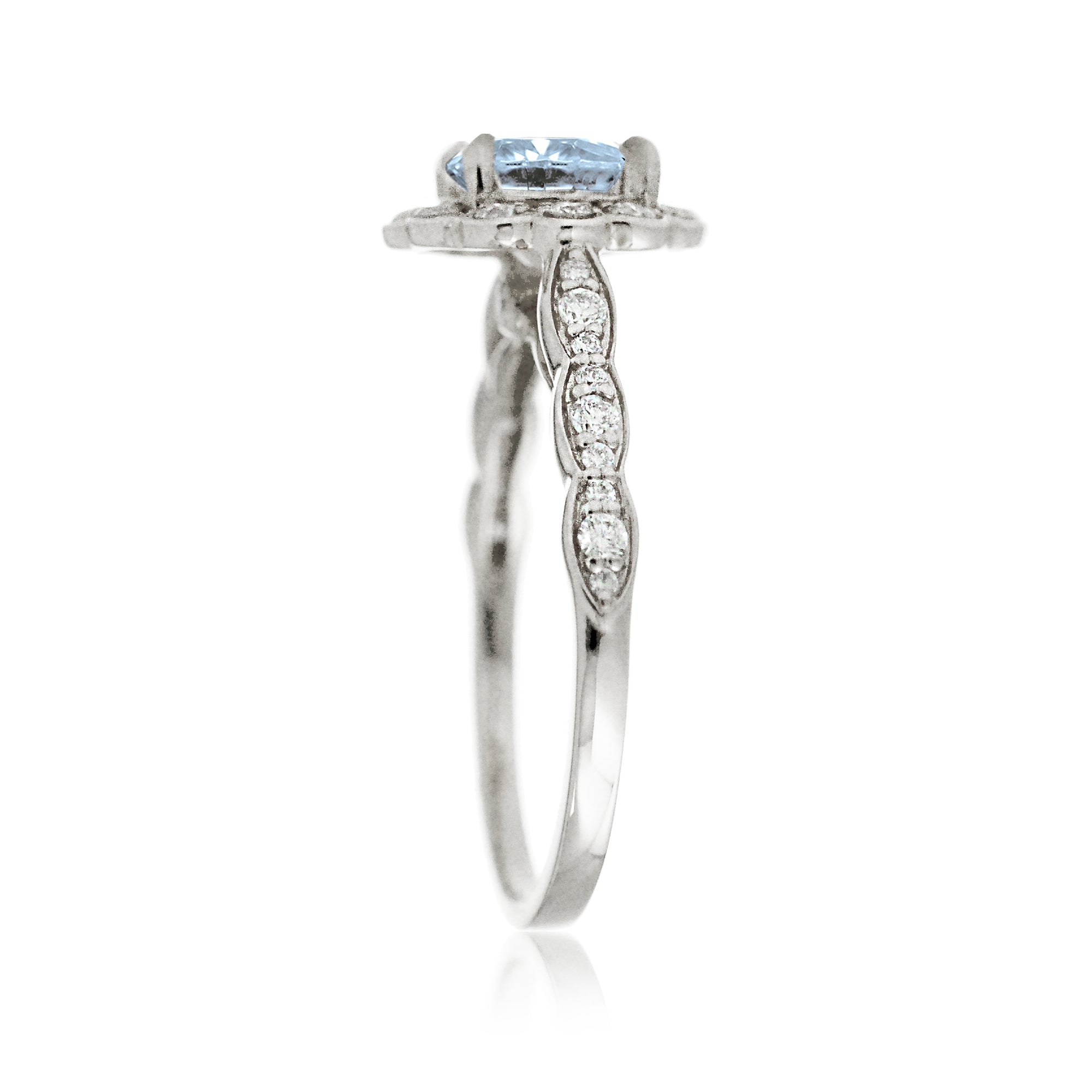 Round cut aquamarine with diamond halo and band the scallop white gold