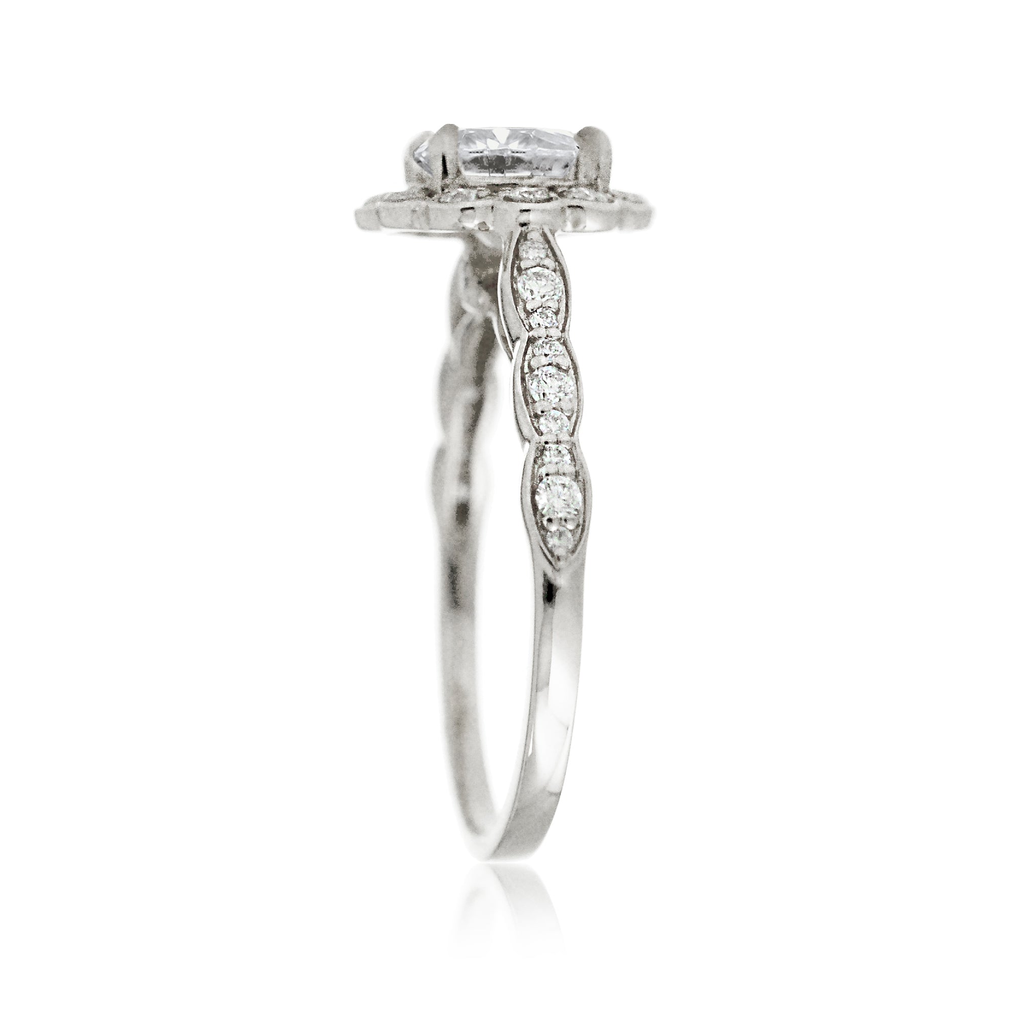 Round brilliant cut diamond scallop halo and band white gold