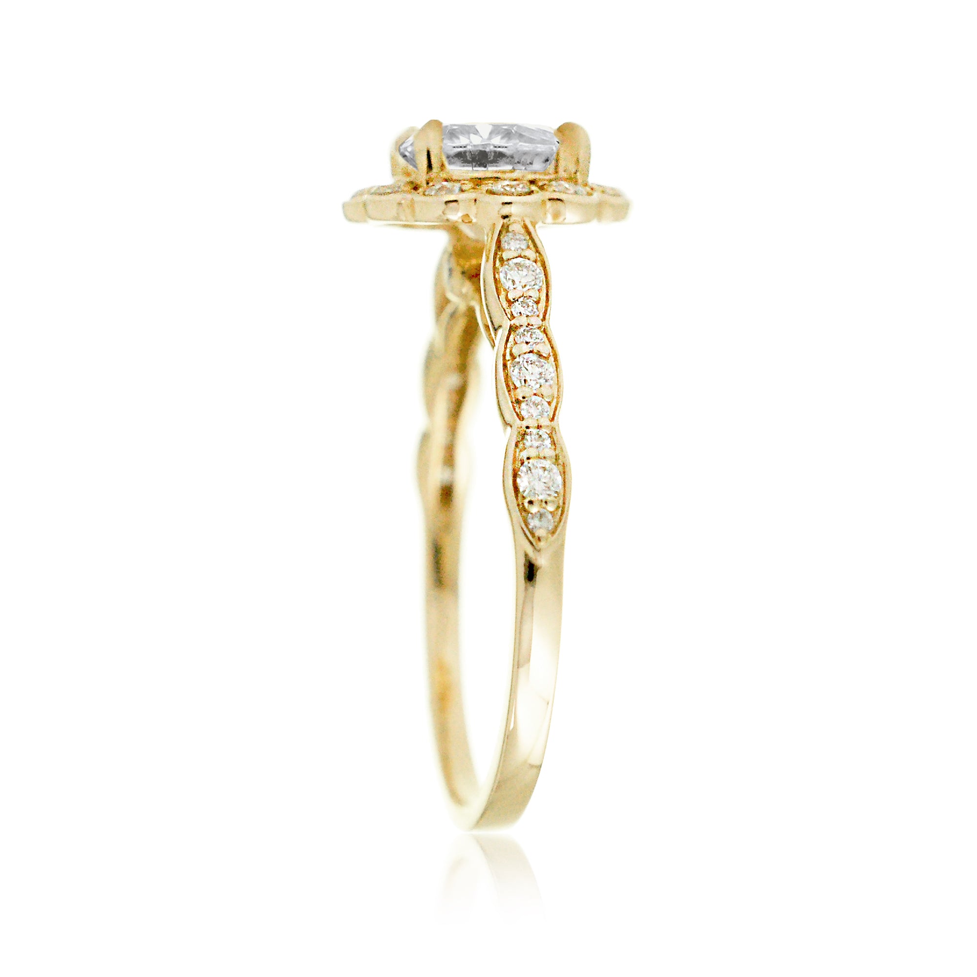 Round brilliant cut diamond scallop halo and band yellow gold