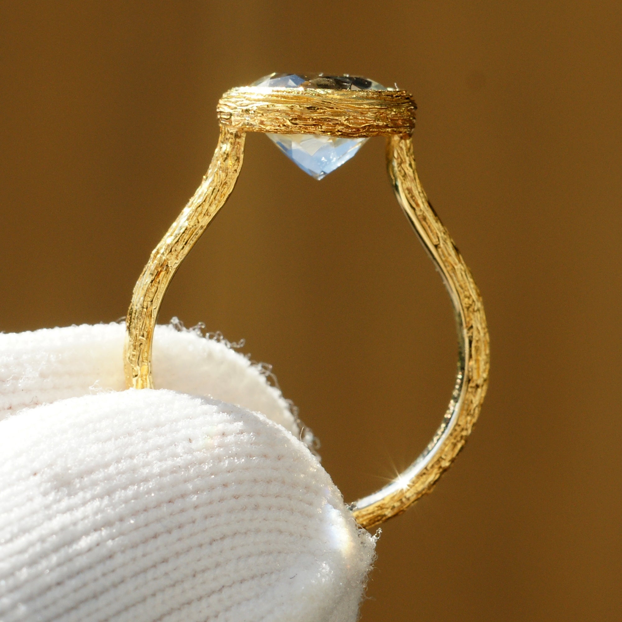 Prasiolite green amethyst solitaire bezel wood grain ring in yellow gold side view
