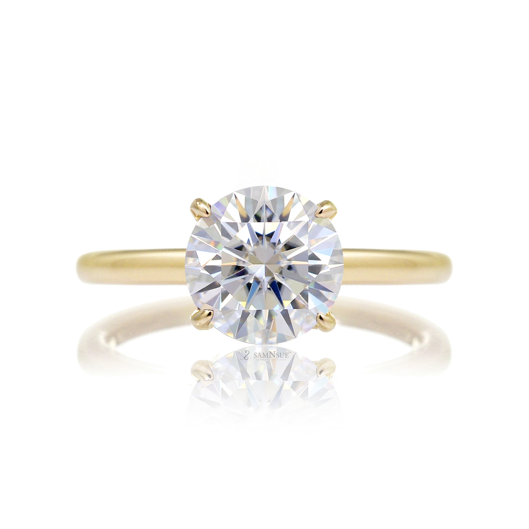 Round cut solitaire diamond engagement ring with a hidden halo and solid polished band in yellow gold