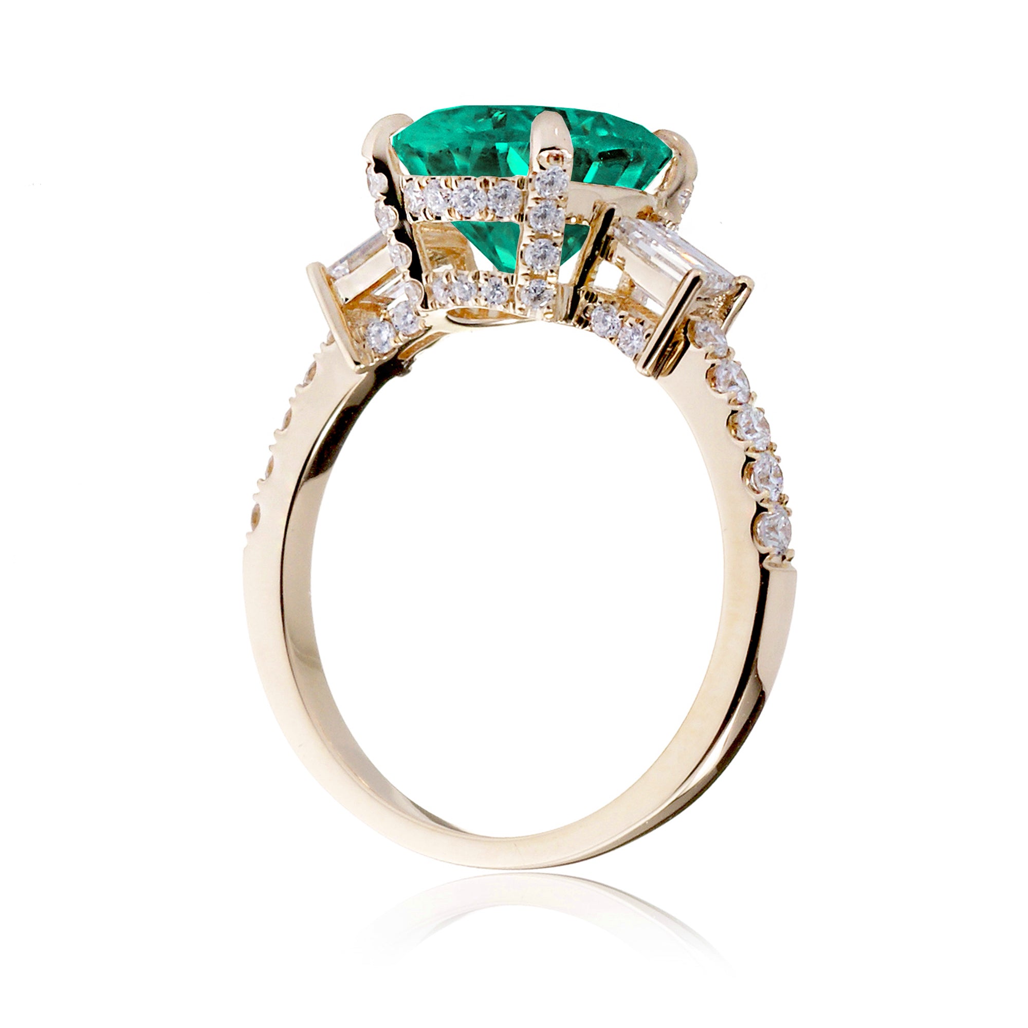 Green emerald three stone diamond baguette engagement ring yellow gold