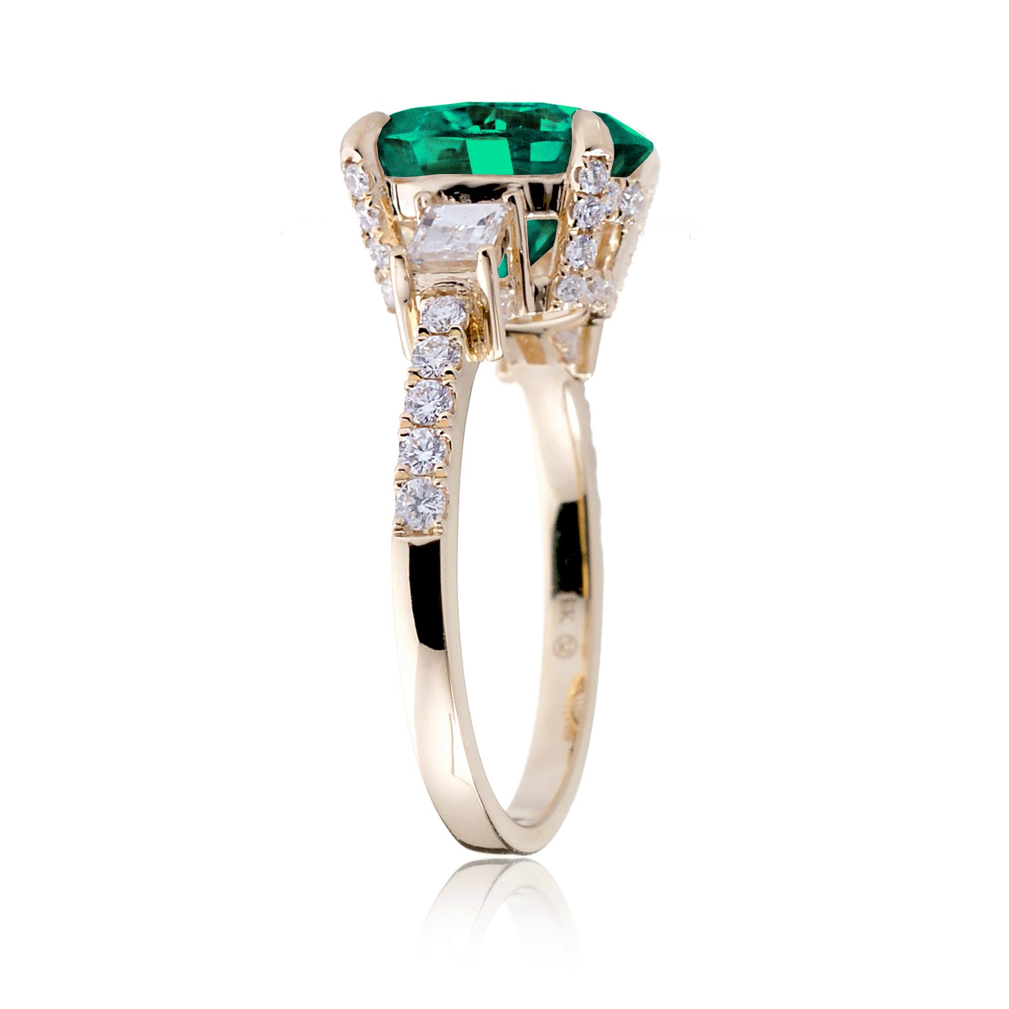 Green emerald three stone diamond baguette engagement ring yellow gold