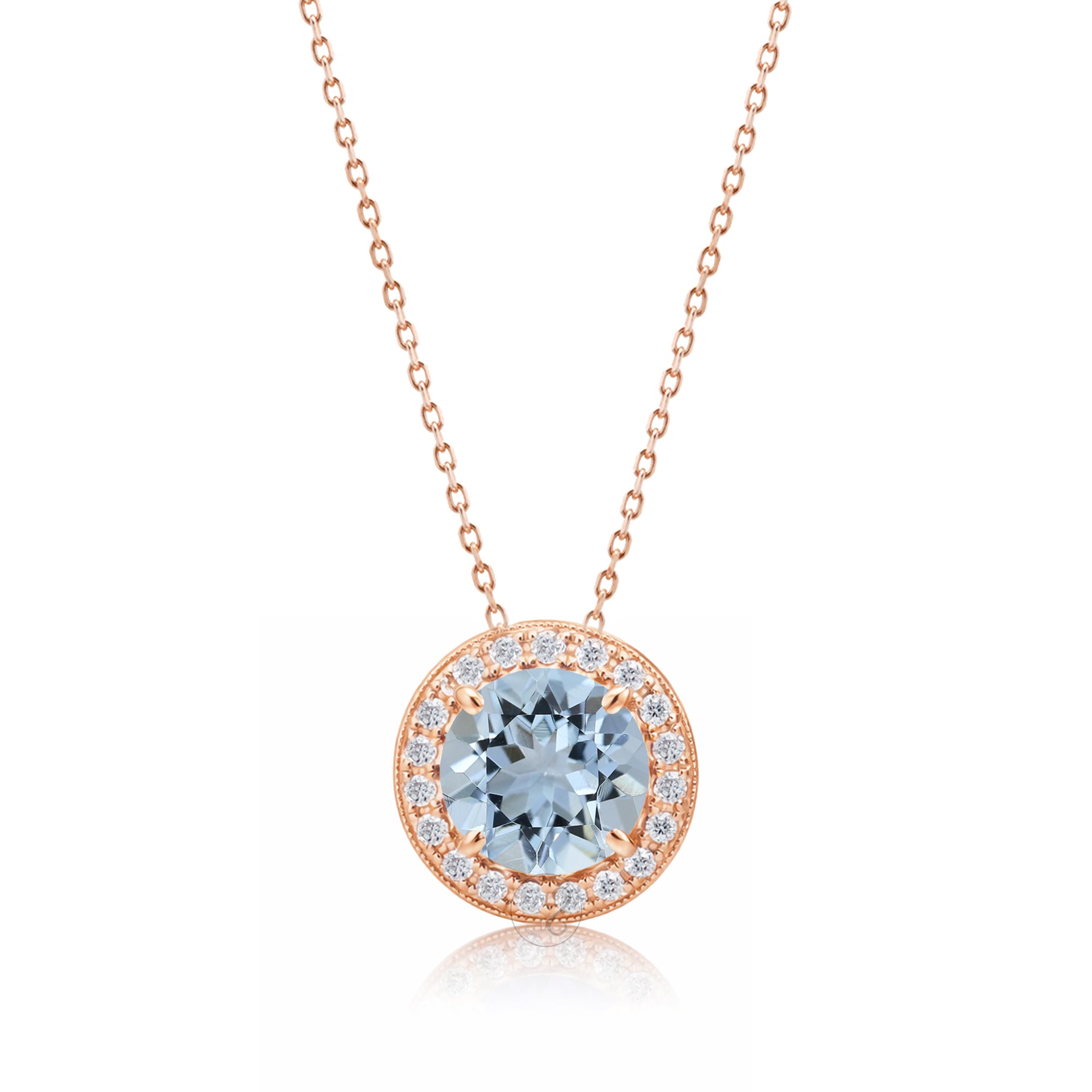 Aquamarine pendant necklace with pave diamond halo with a cable chain in rose gold