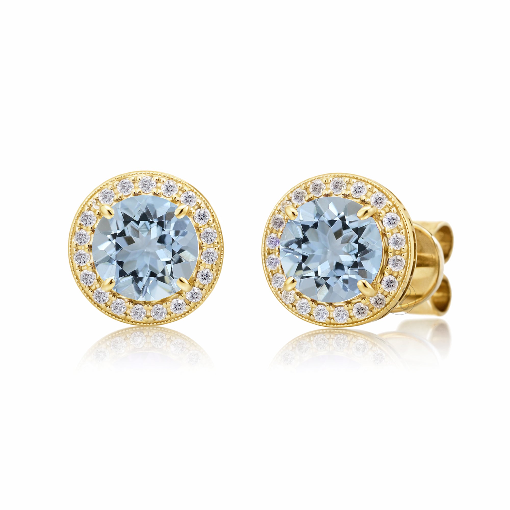 Aquamarine stud earrings with pave diamond halo with push backs in yellow gold
