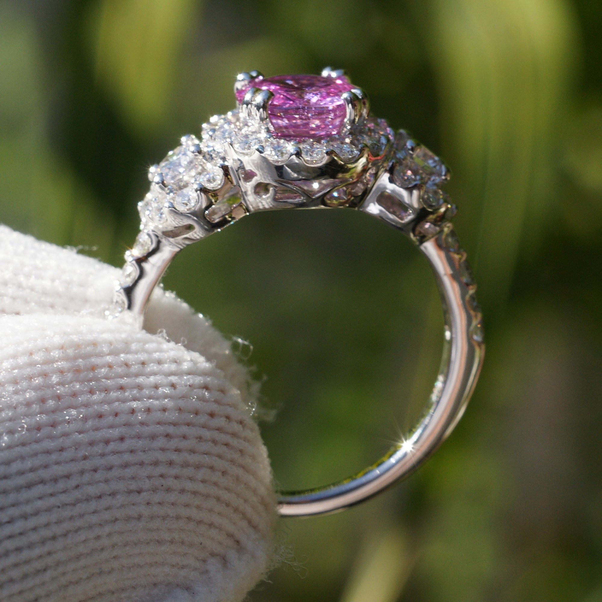 Pink sapphire three stone diamond halo engagement anniversary ring in white gold