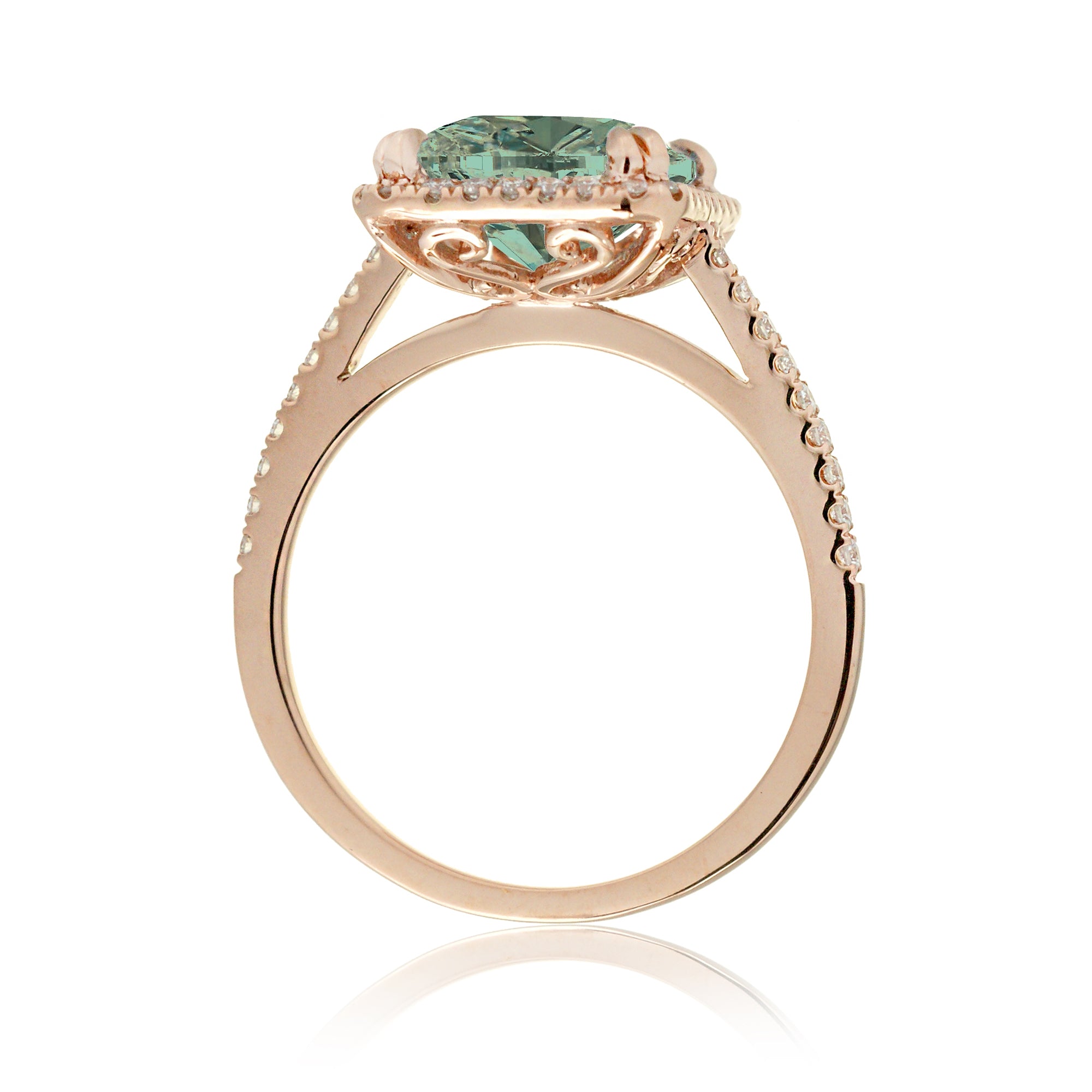 Cushion cut green sapphire engagement ring The signature diamond halo in rose gold