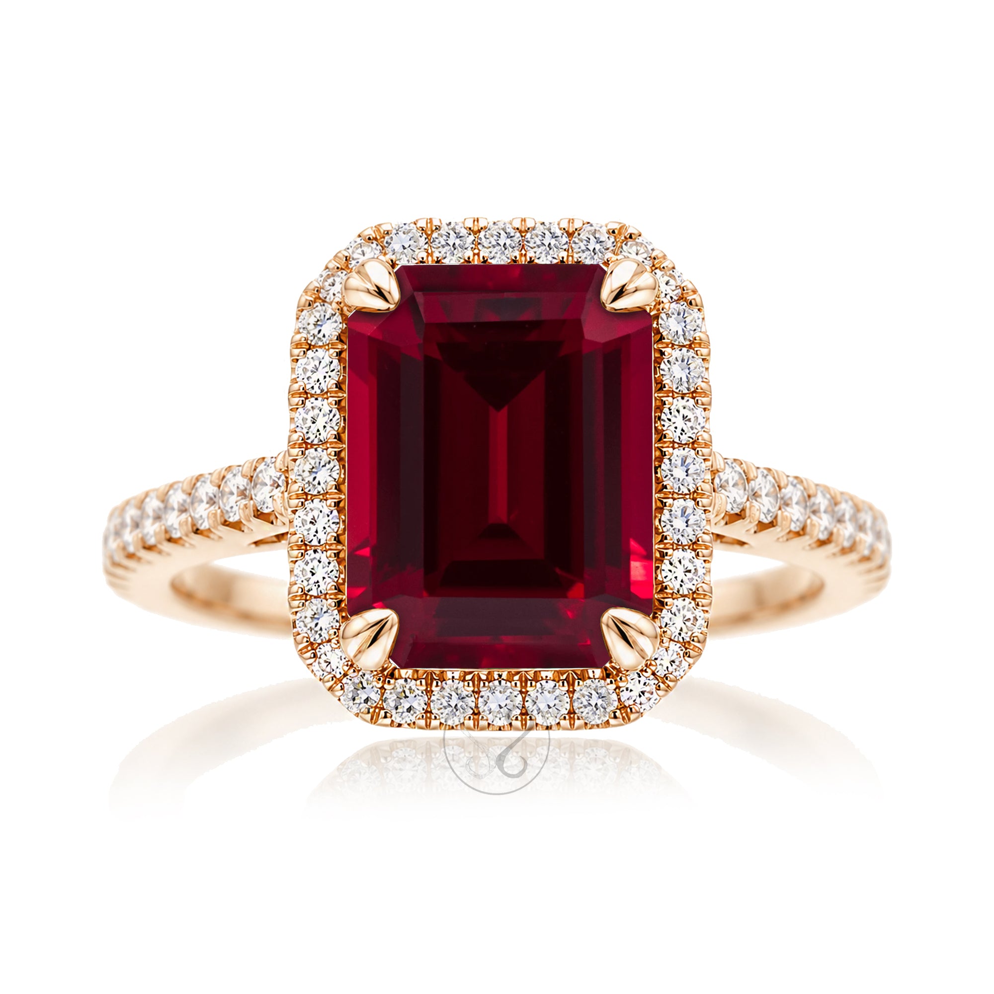 Emerald step cut ruby halo ring with a squarish band and cathedral setting rose gold