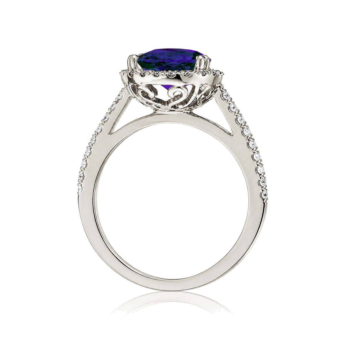 Pear cut blue sapphire ring with a diamond halo square band in a white gold cathedral setting