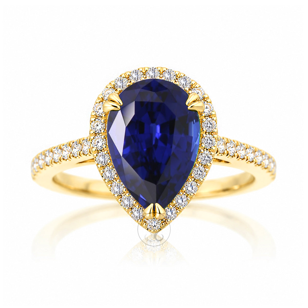 Pear cut blue sapphire ring with a diamond halo square band in a yellow gold cathedral setting
