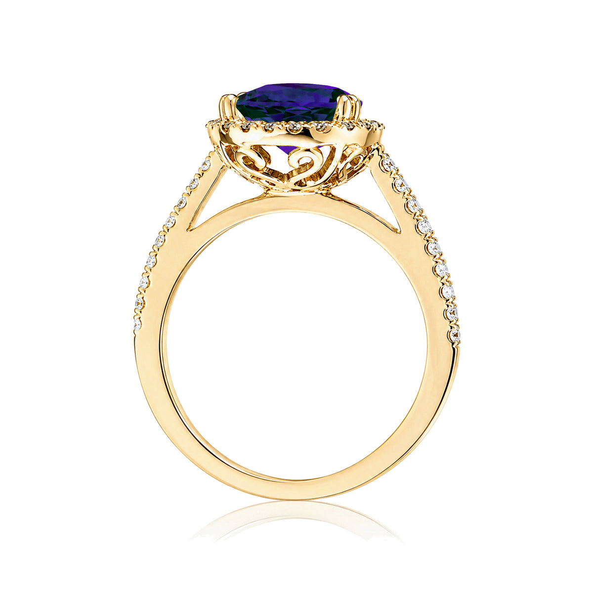 Pear cut blue sapphire ring with a diamond halo square band in a yellow gold cathedral setting