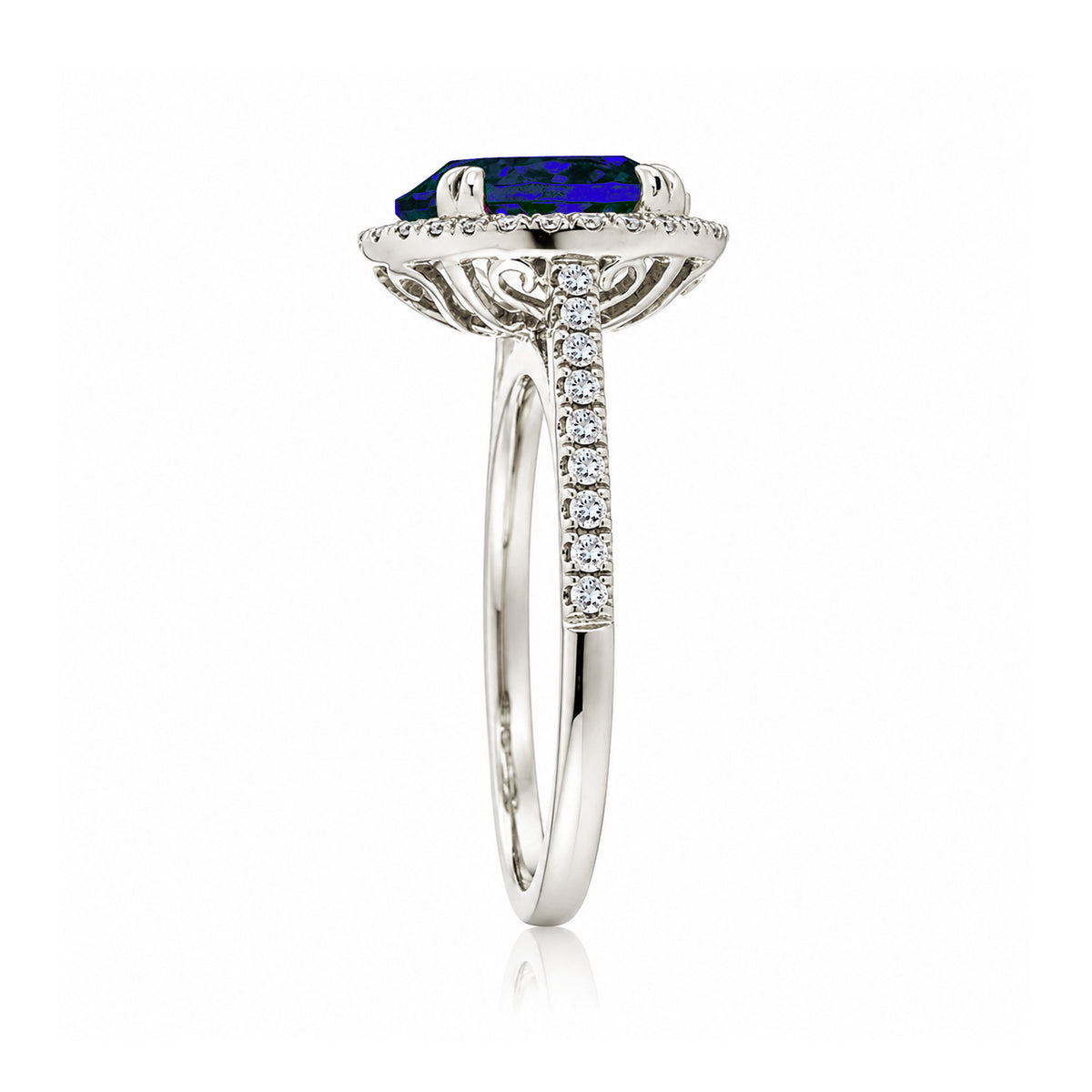 Round blue sapphire diamond halo ring with squarish diamond band white gold