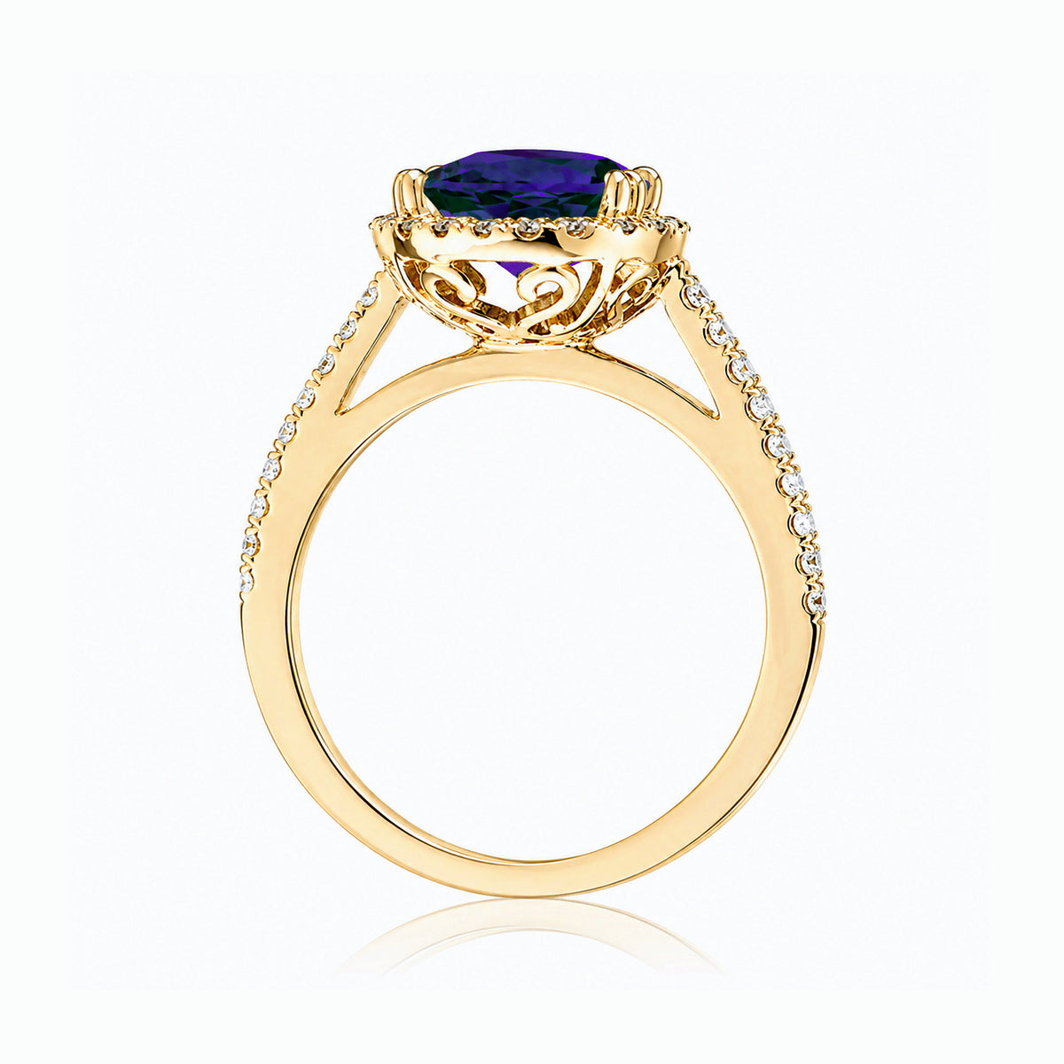 Round blue sapphire diamond halo ring with squarish diamond band yellow gold
