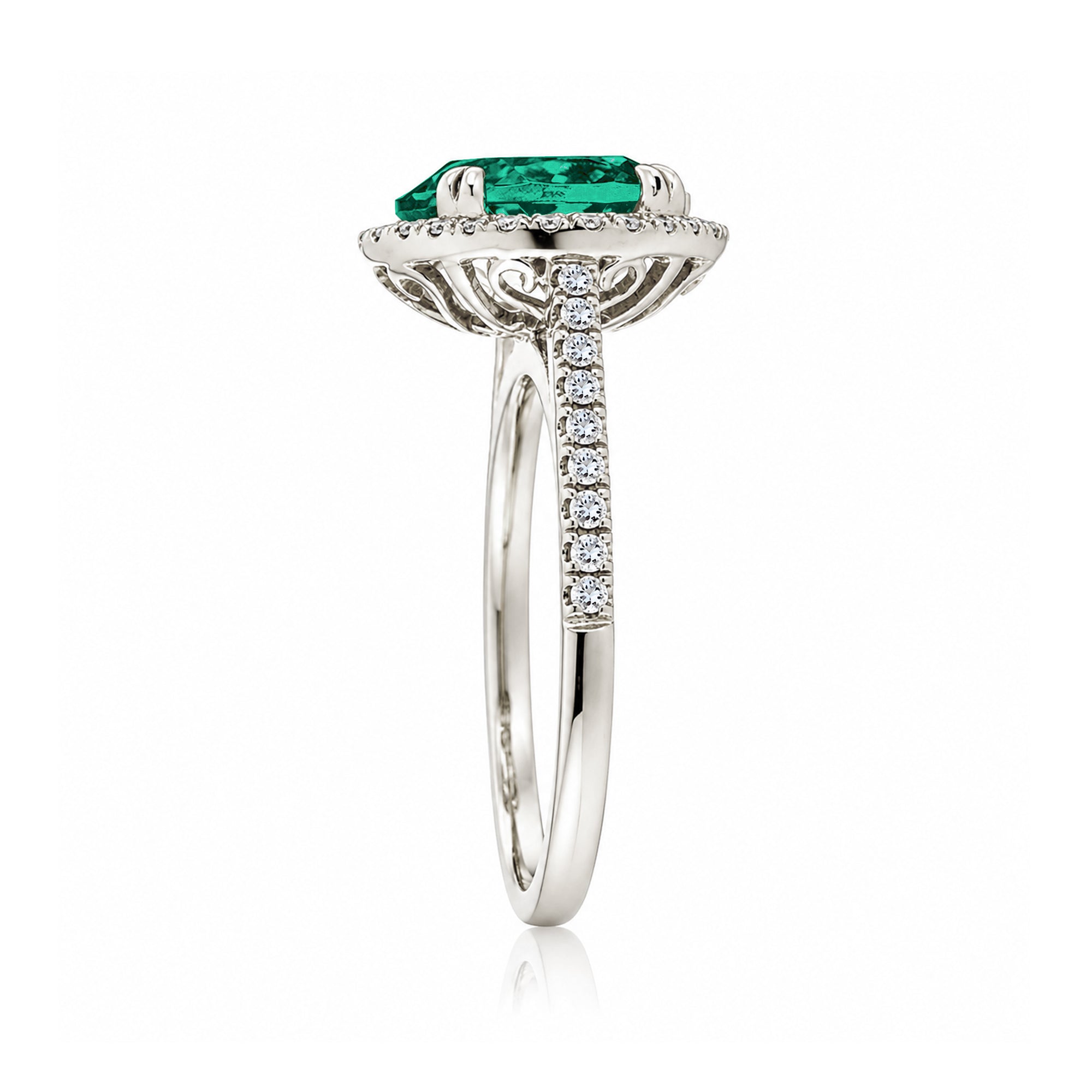 Round emerald diamond halo ring with squarish diamond band white gold