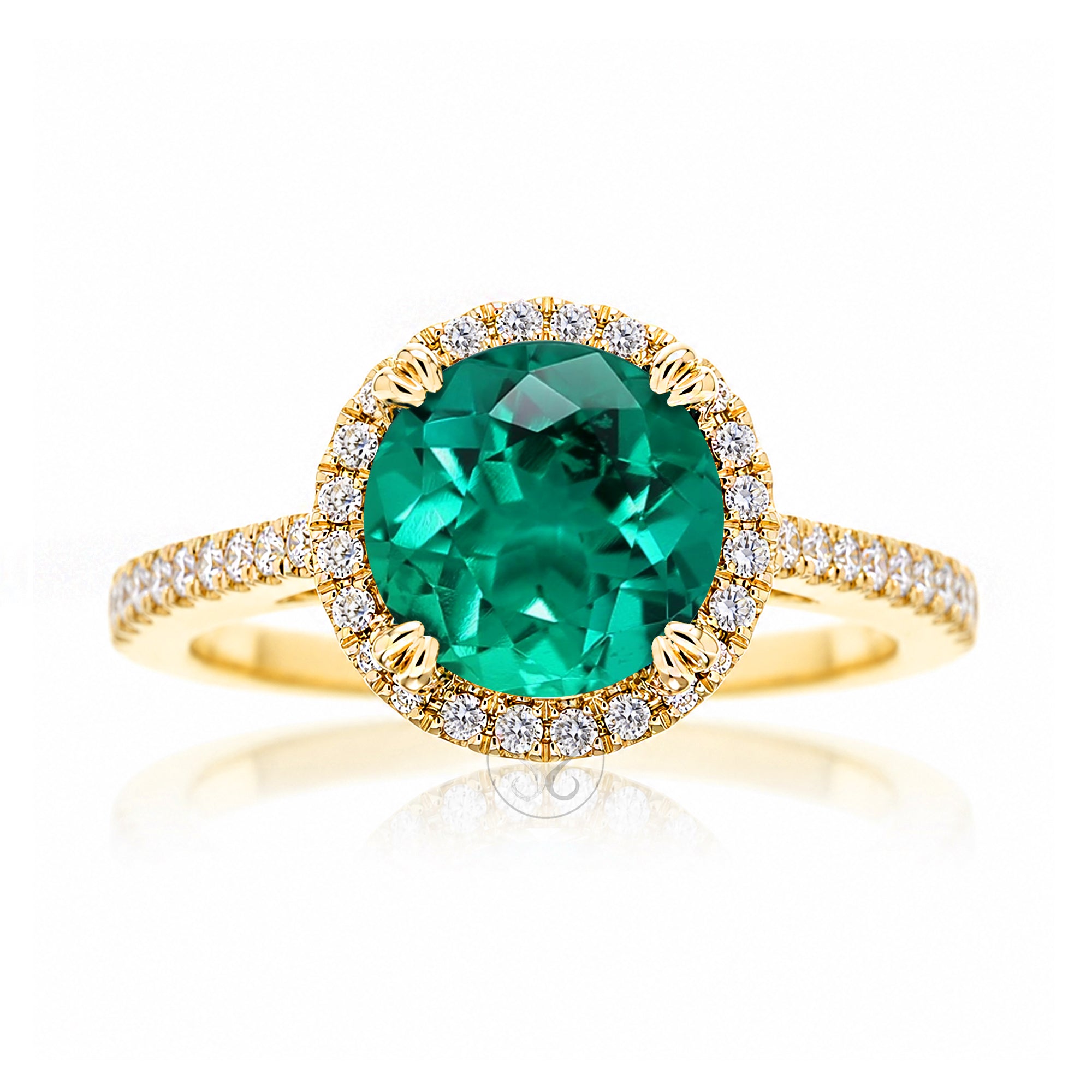 Round emerald diamond halo ring with squarish diamond band yellow gold