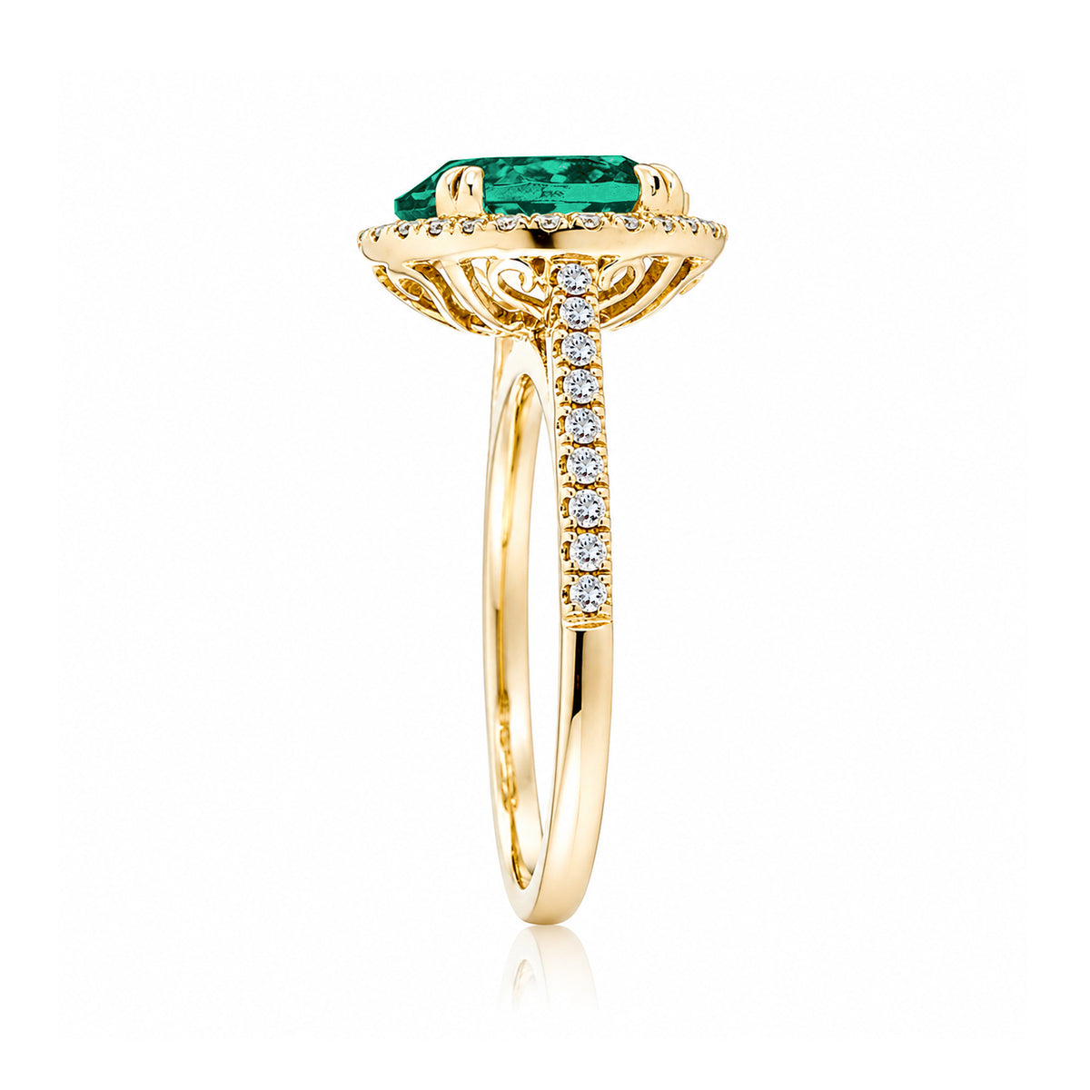 Round emerald diamond halo ring with squarish diamond band yellow gold