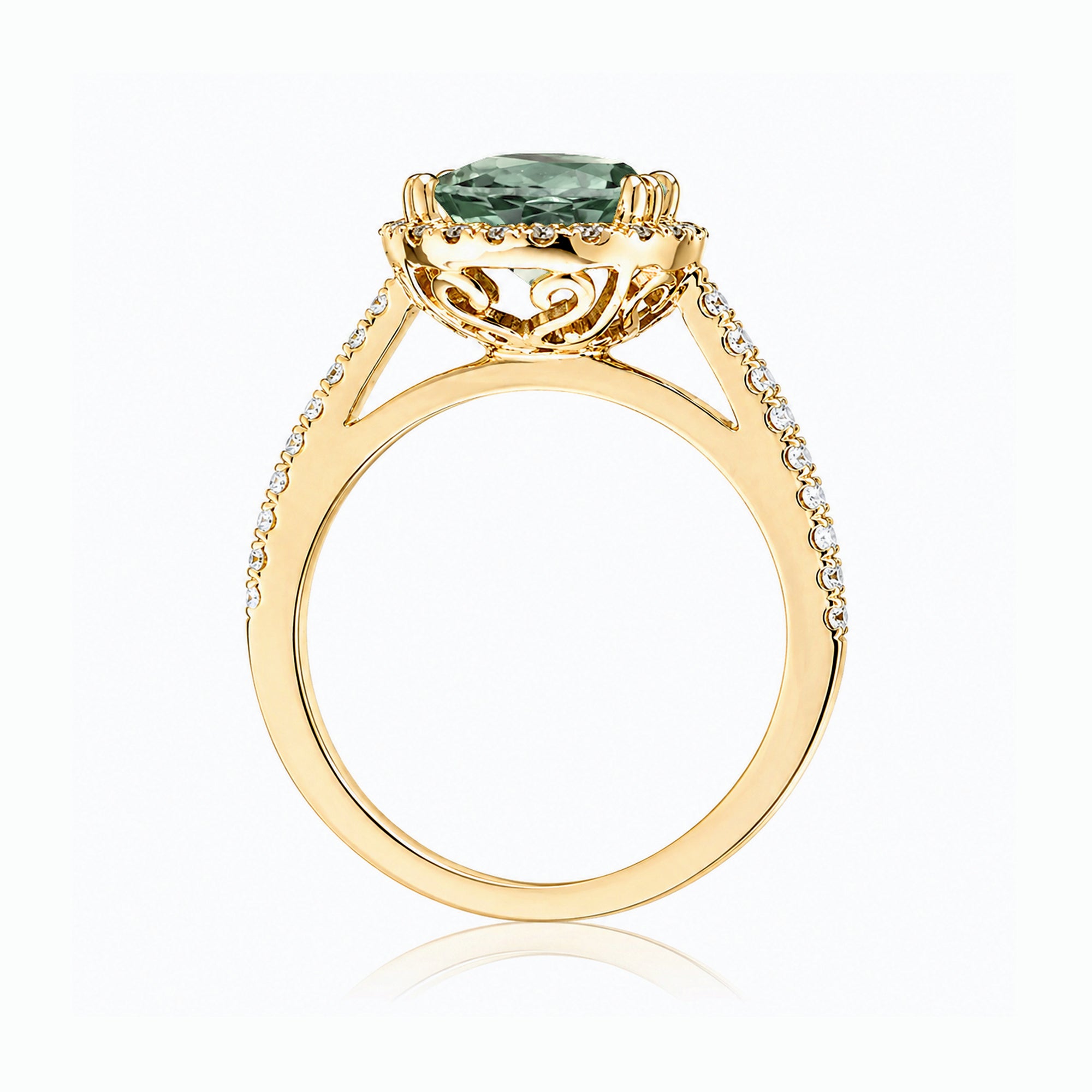 Round green sapphire diamond halo ring with squarish diamond band yellow gold