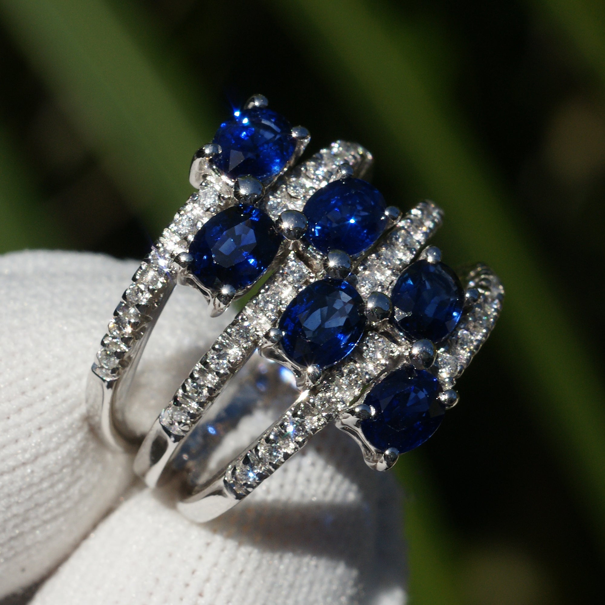Sapphire cocktail anniversary diamond band white gold