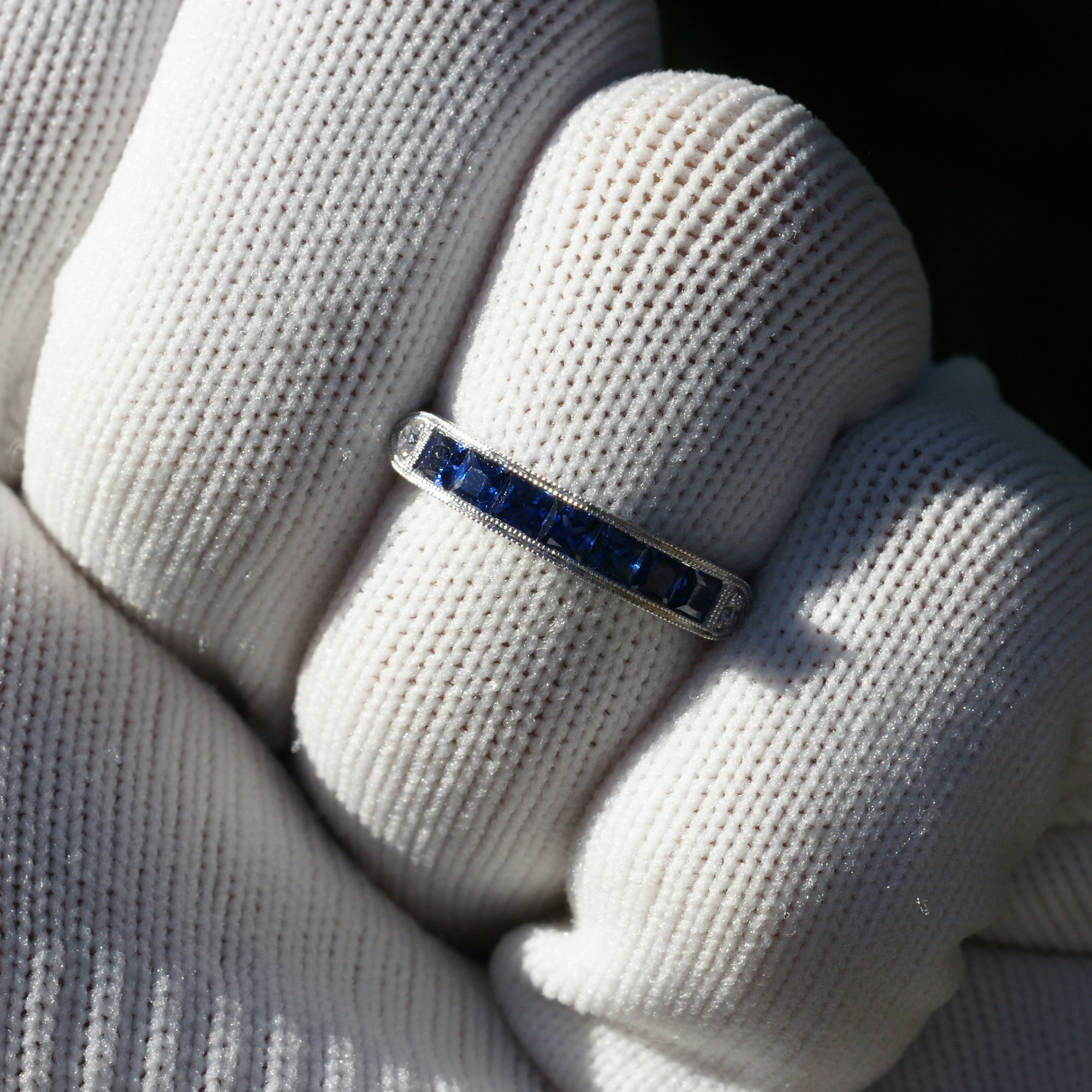 Channel set blue sapphire wedding anniversary band vintage style white gold