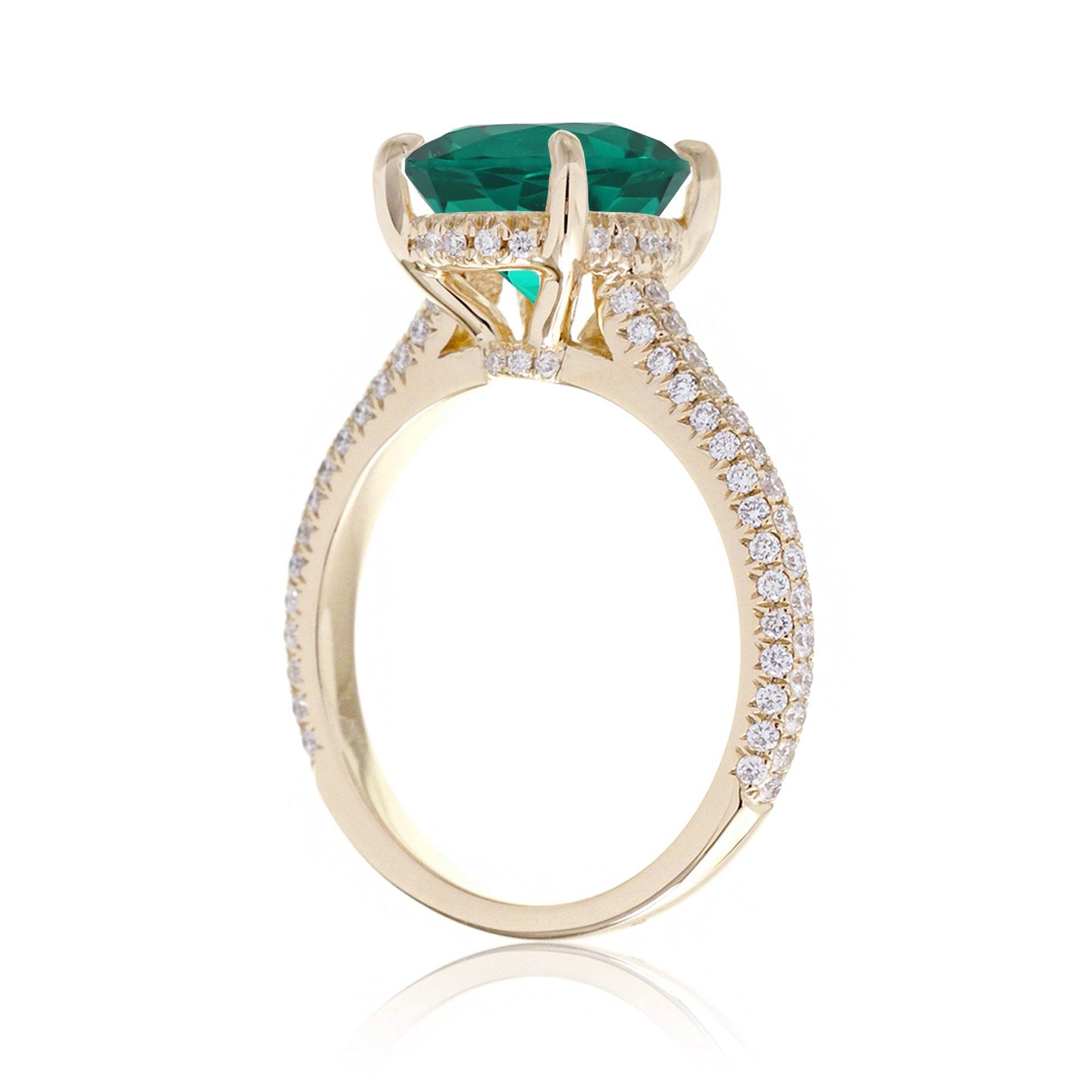 Oval Cut Emerald Ring with Diamond Accents in Rose, White, or Yellow Gold