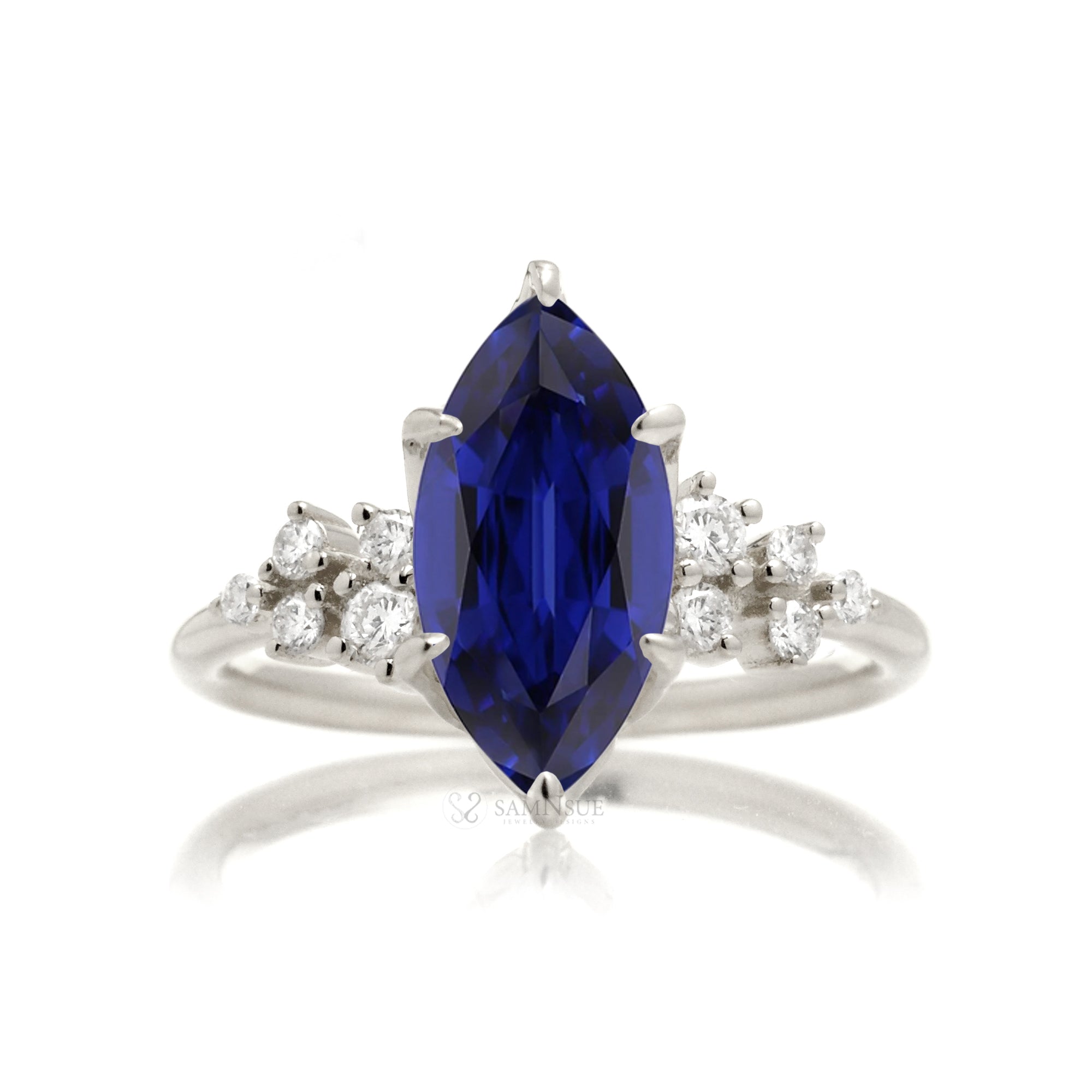The Stella Marquise Cut Blue Sapphire And Diamond Ring