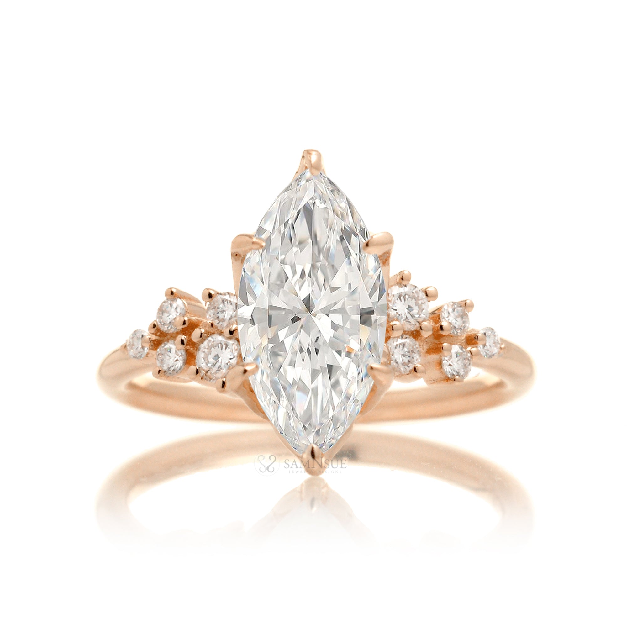 Marquise cut diamond solitaire with accent side constellation diamond in rose gold