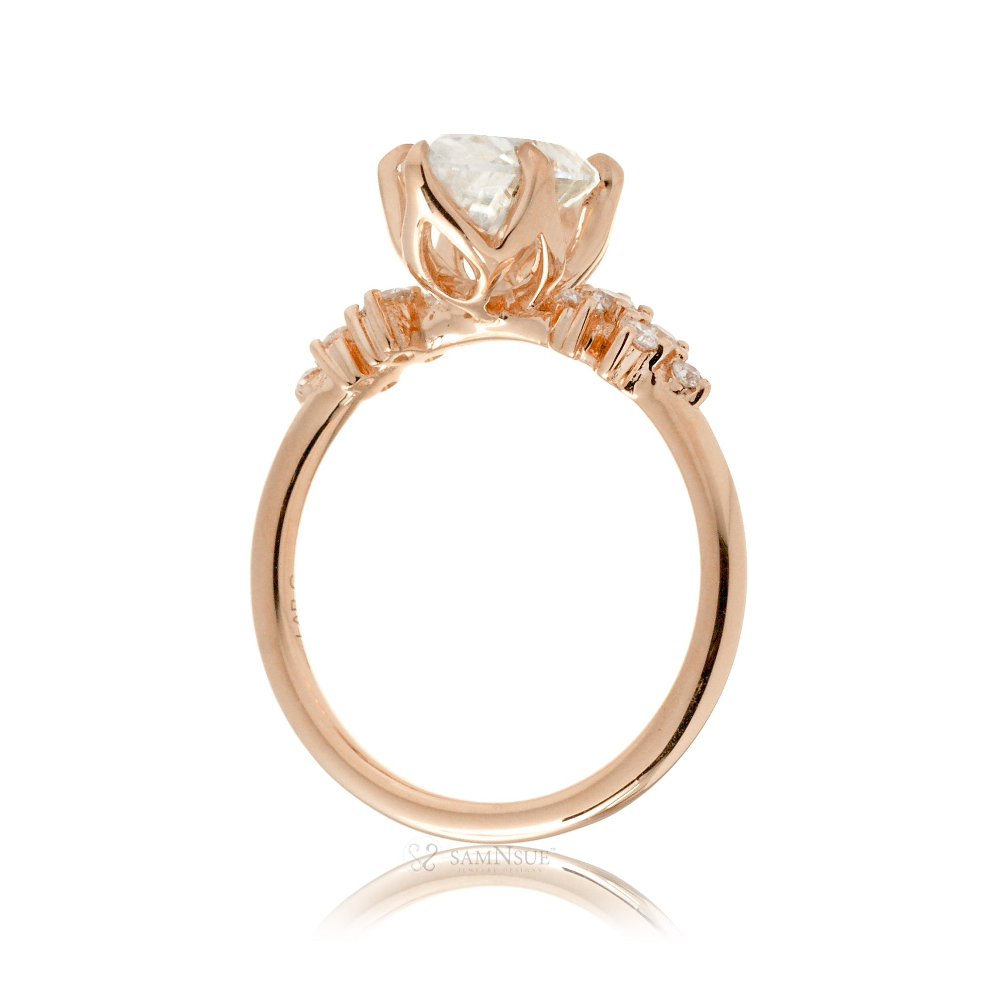 Marquise cut moissanite crown basket and diamond side stone ring rose gold