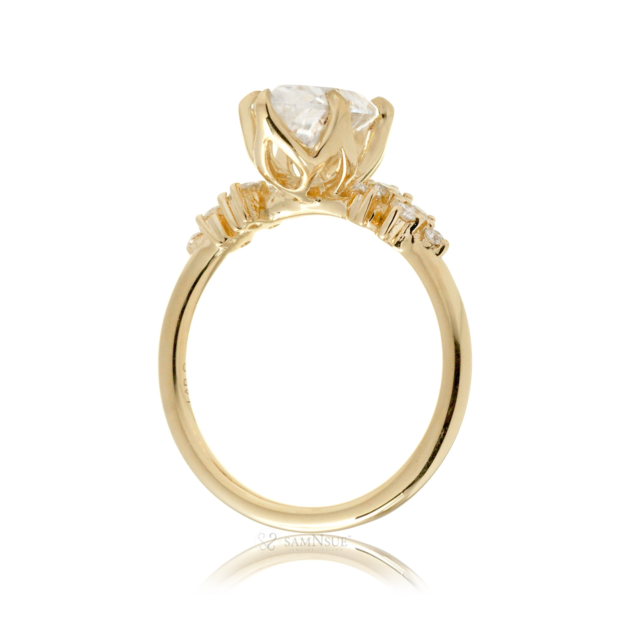 Marquise cut moissanite crown basket and diamond side stone ring yellow gold