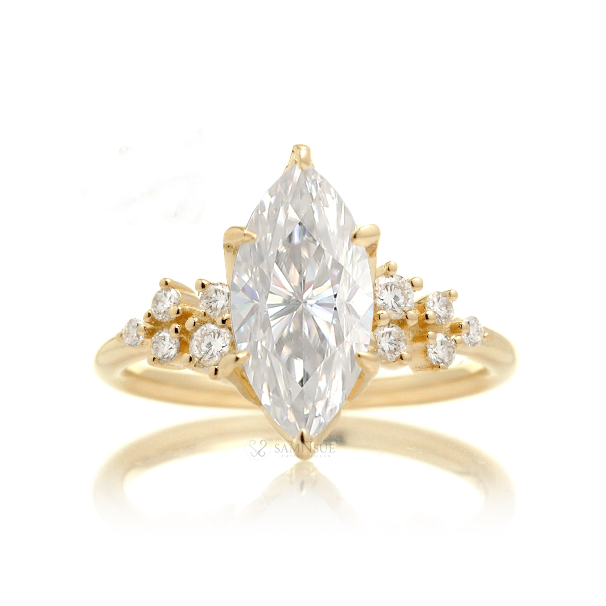 Marquise cut moissanite and diamond side stone ring yellow gold