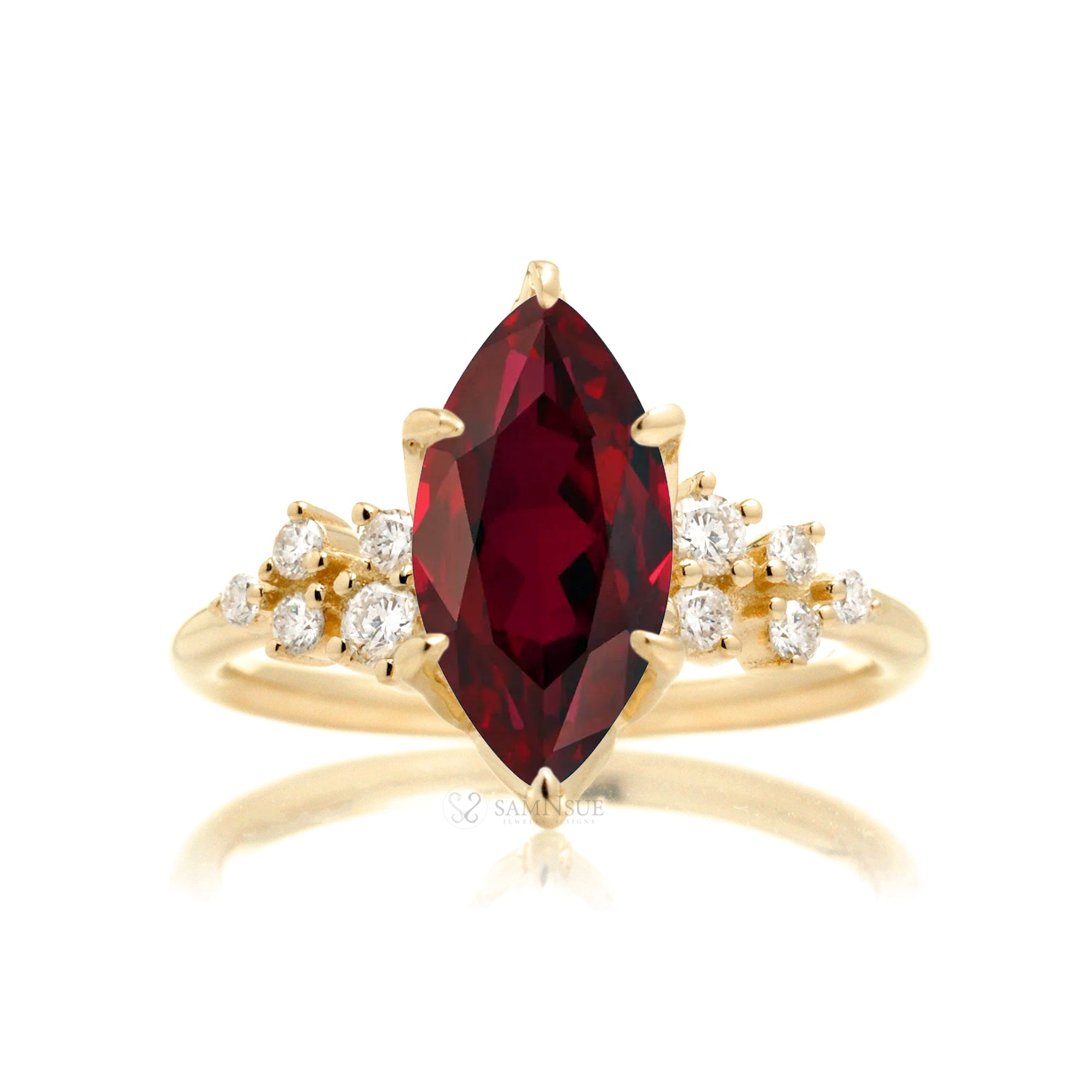 Marquise ruby and diamond solitaire engagement ring in yellow gold