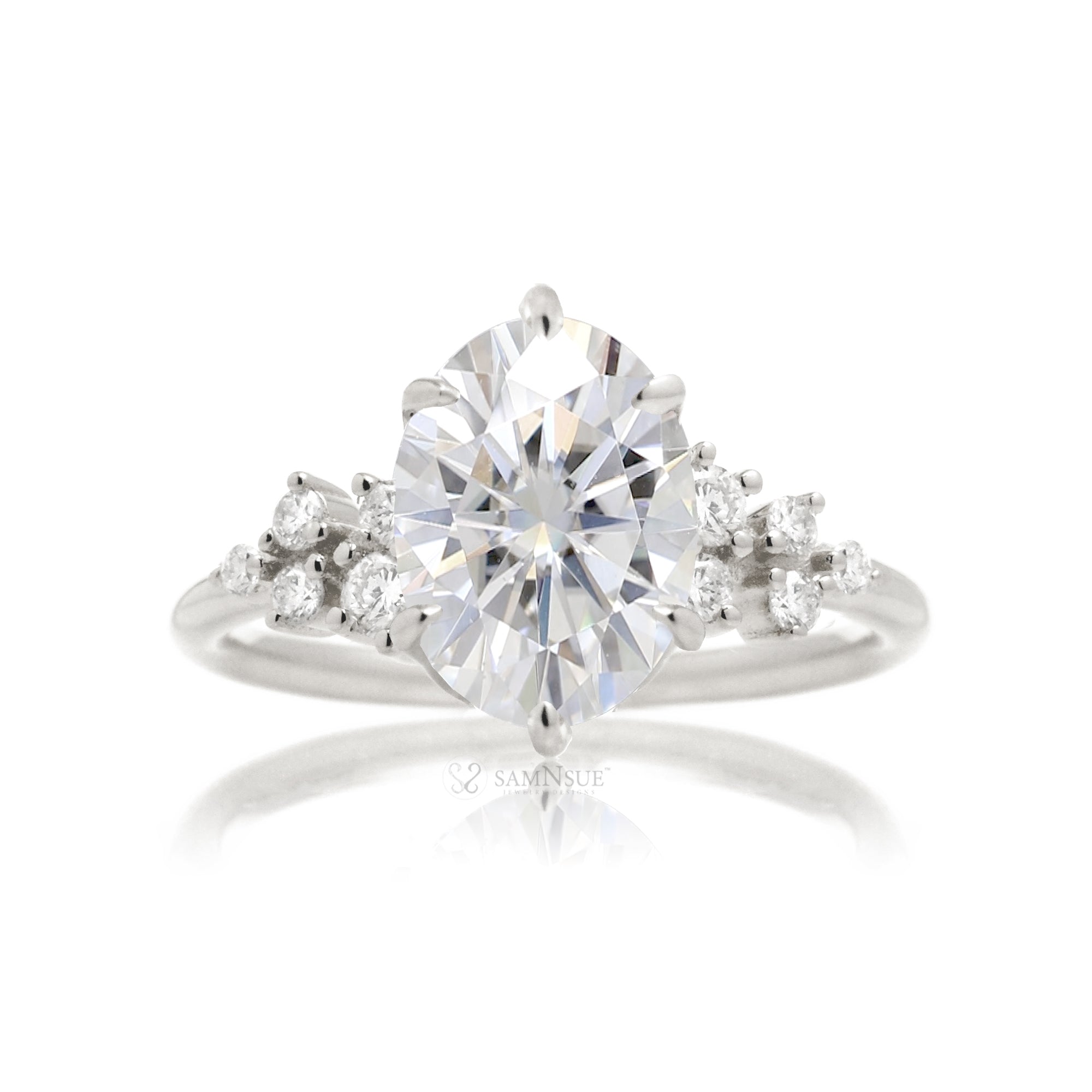 Oval moissanite ring with side diamond constellation in the Stella white gold ring