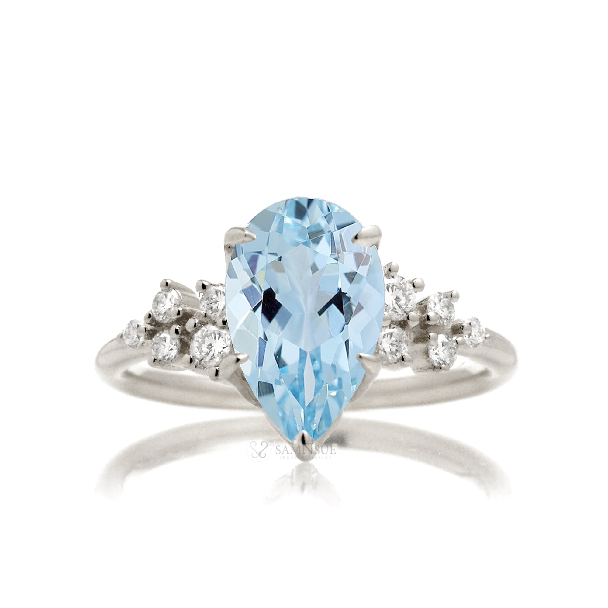 Pear aquamarine diamond three stone ring white gold
