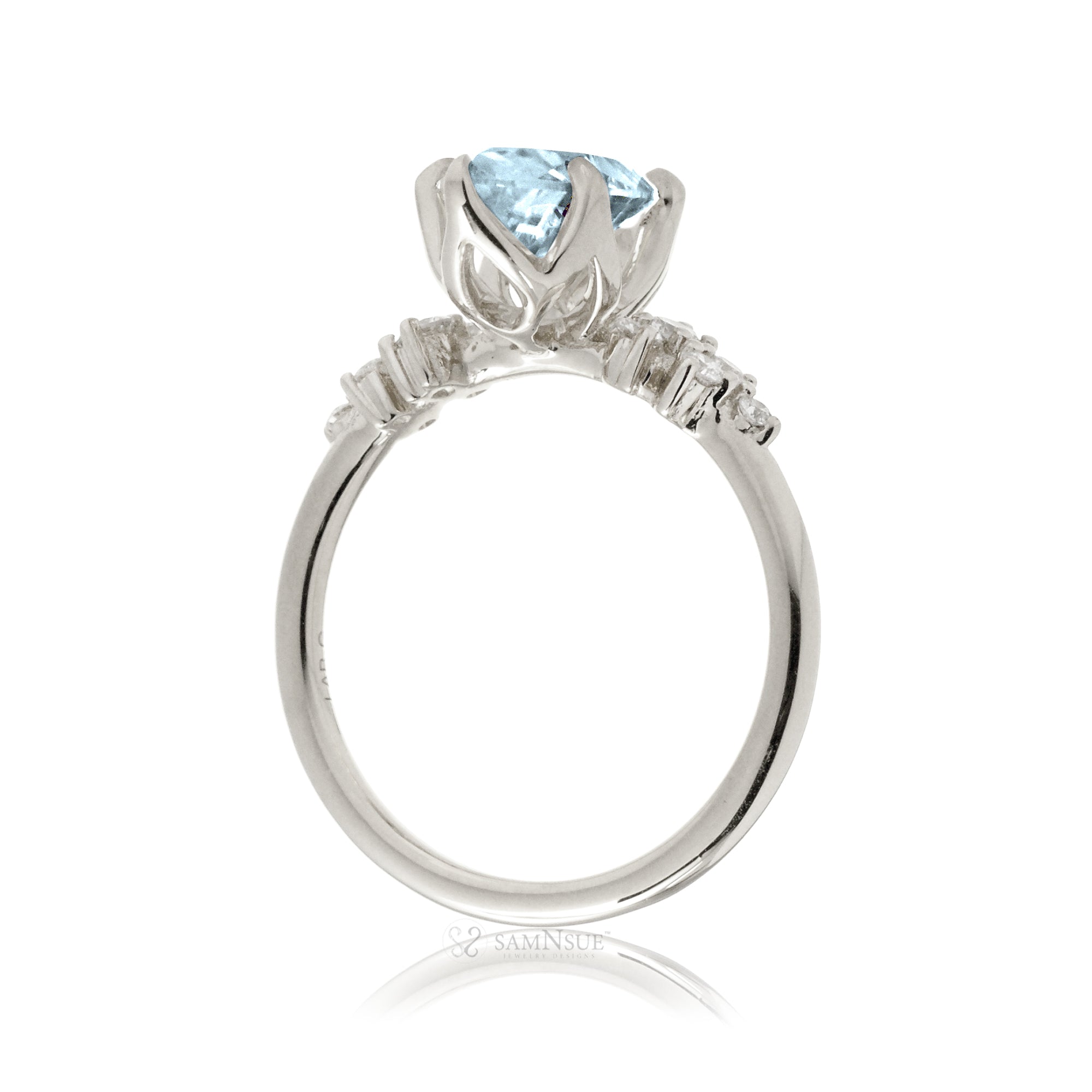 Pear aquamarine diamond three stone ring white gold