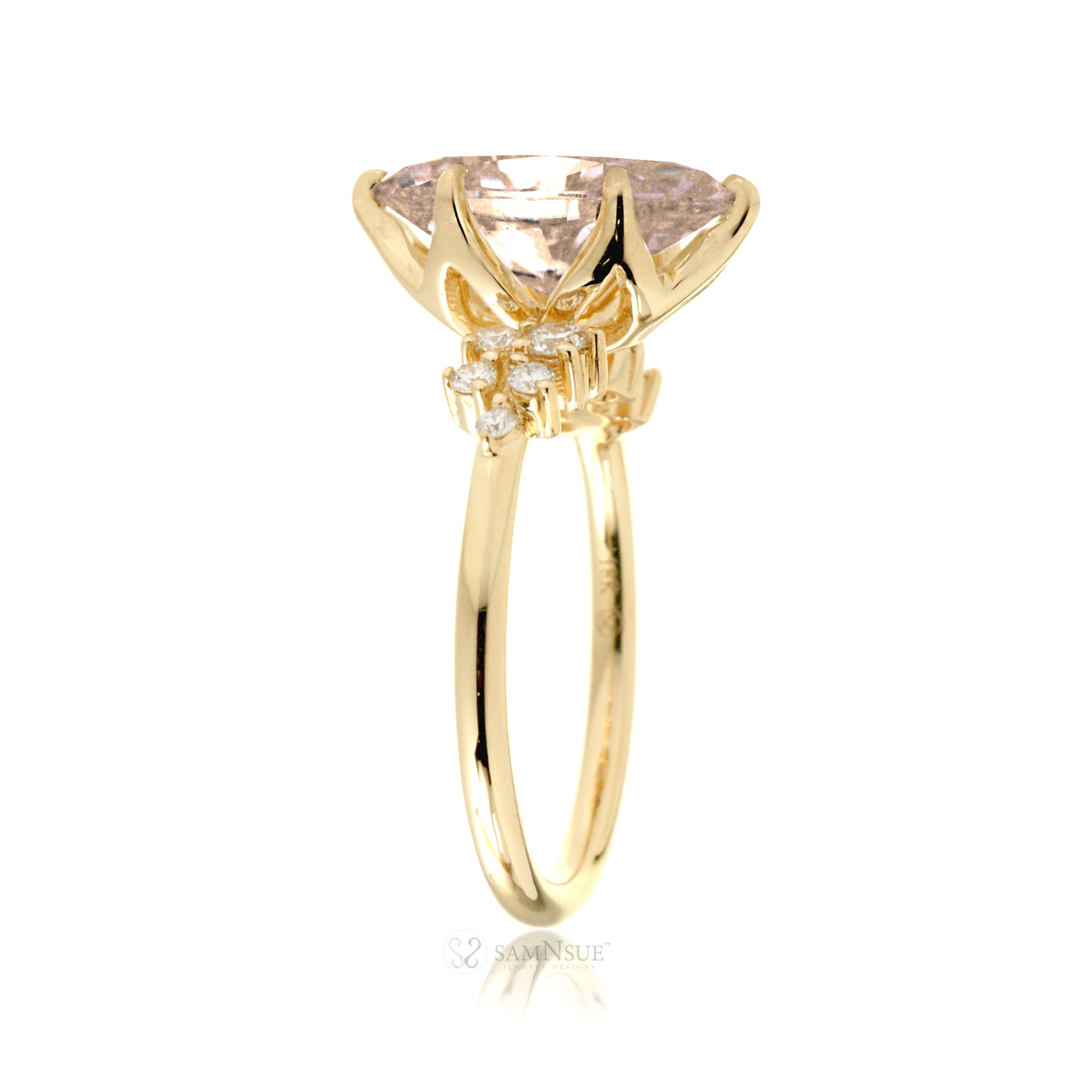 Pear morganite three stone diamond ring yellow gold