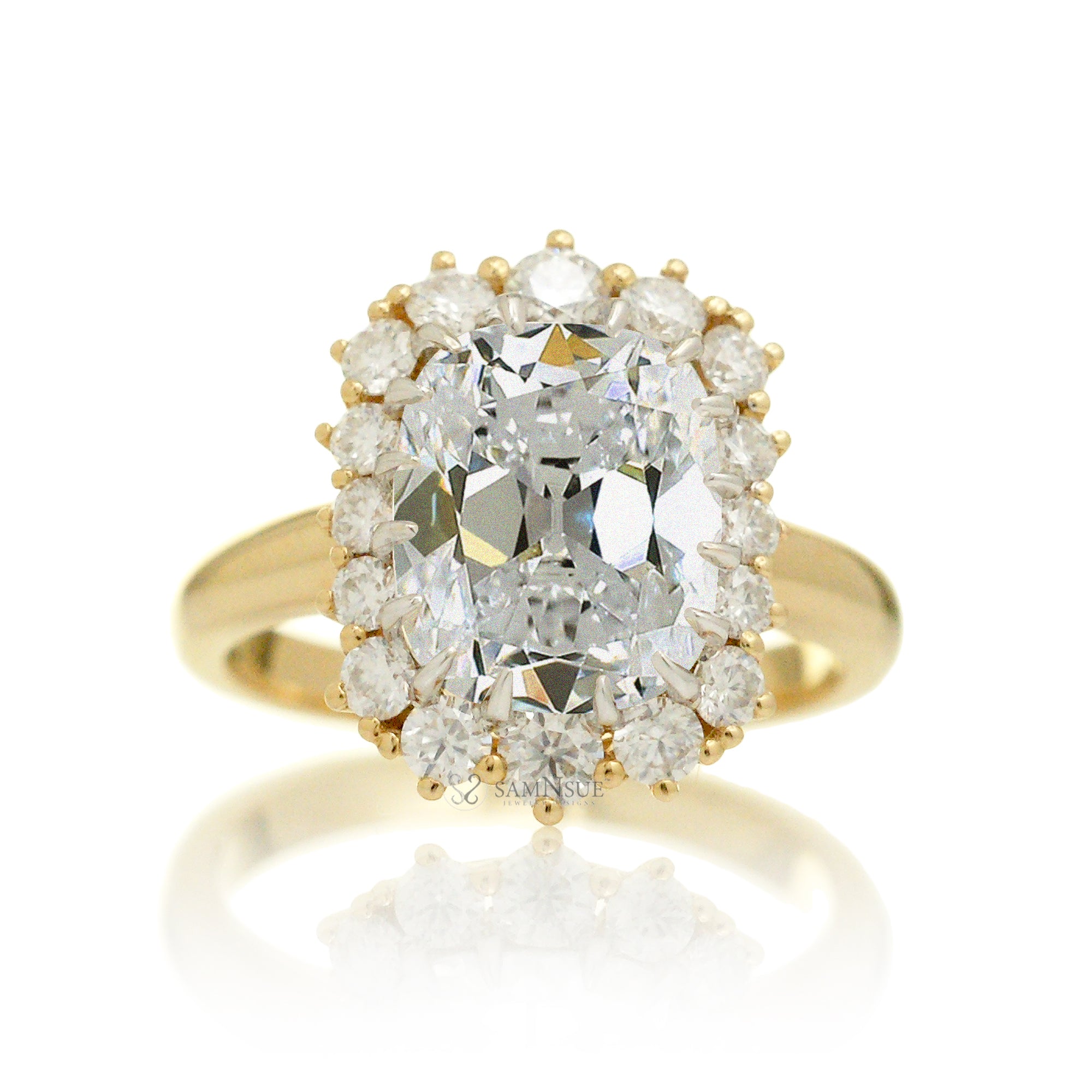 Old mine cut diamond and halo vintage style ring yellow gold