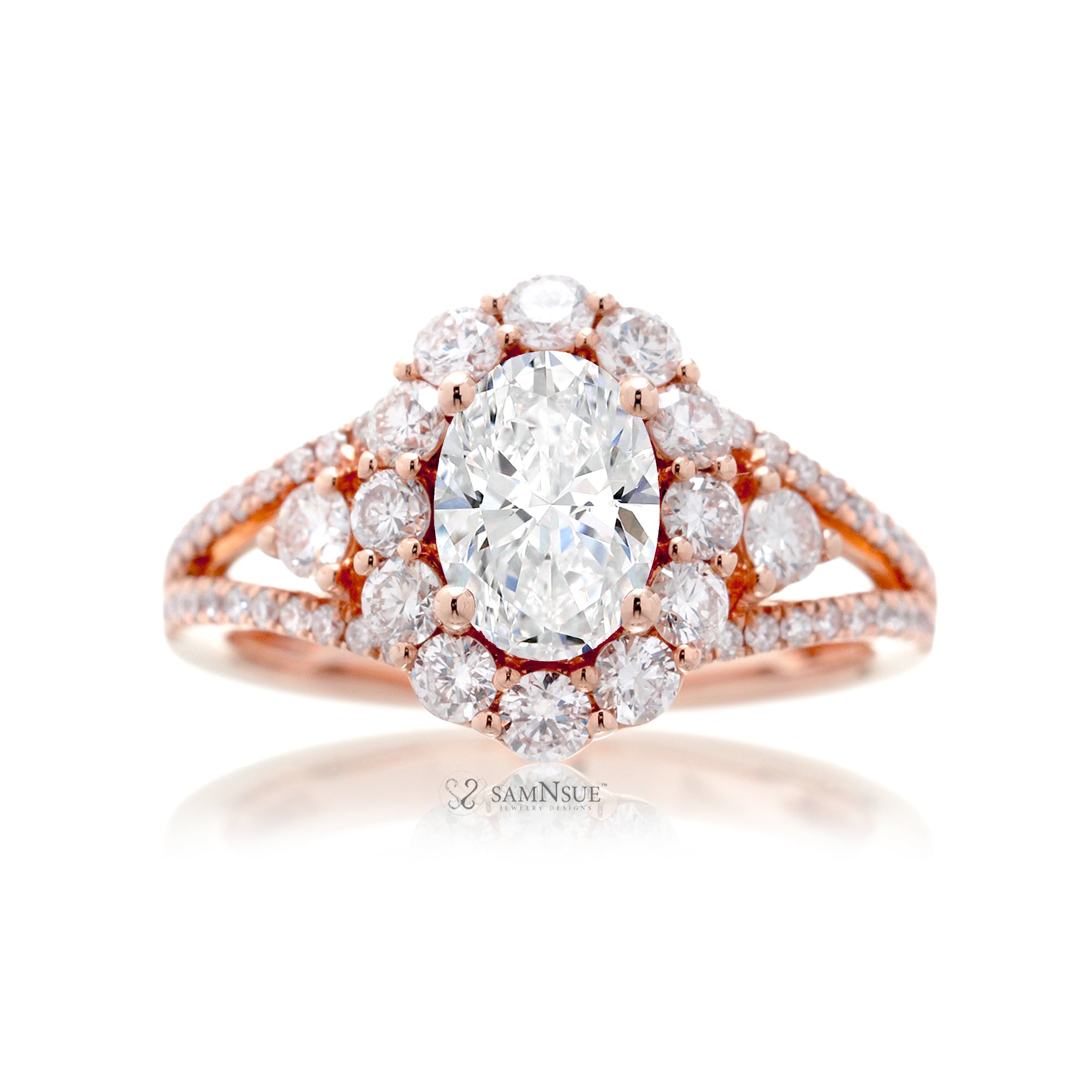 Oval diamond ring with halo split band and three stone design in rose gold