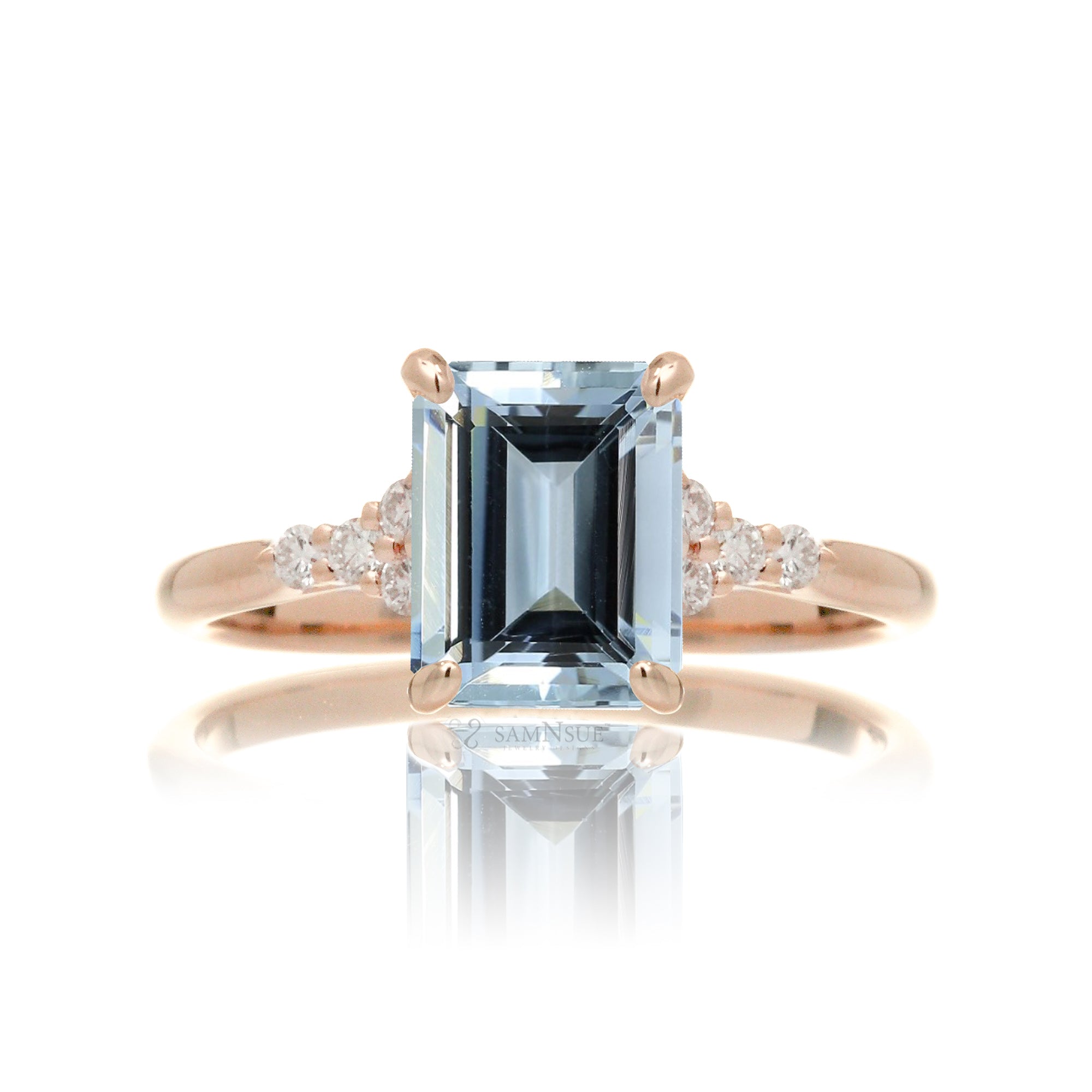 Aquamarine ring emerald cut with solid rounded band in rose gold