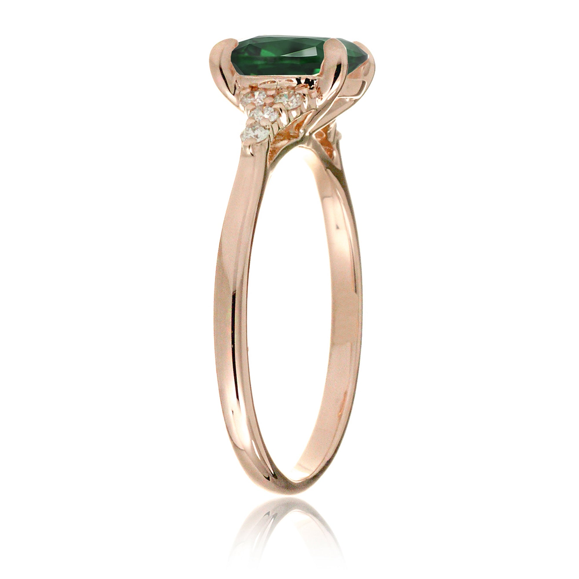 Cushion cut lab-grown emerald diamond three stone ring rose gold
