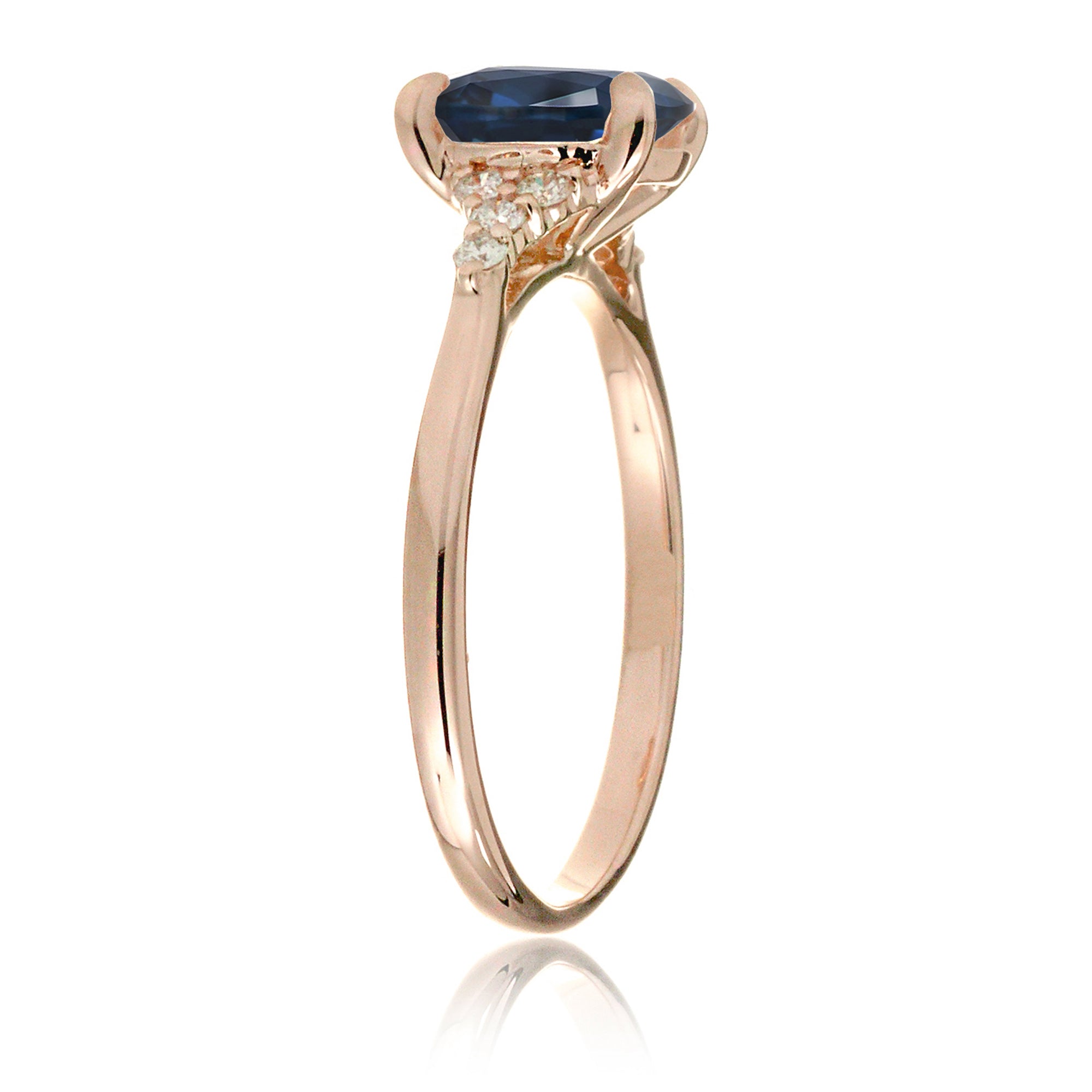 Cushion cut diamond three stone ring rose gold