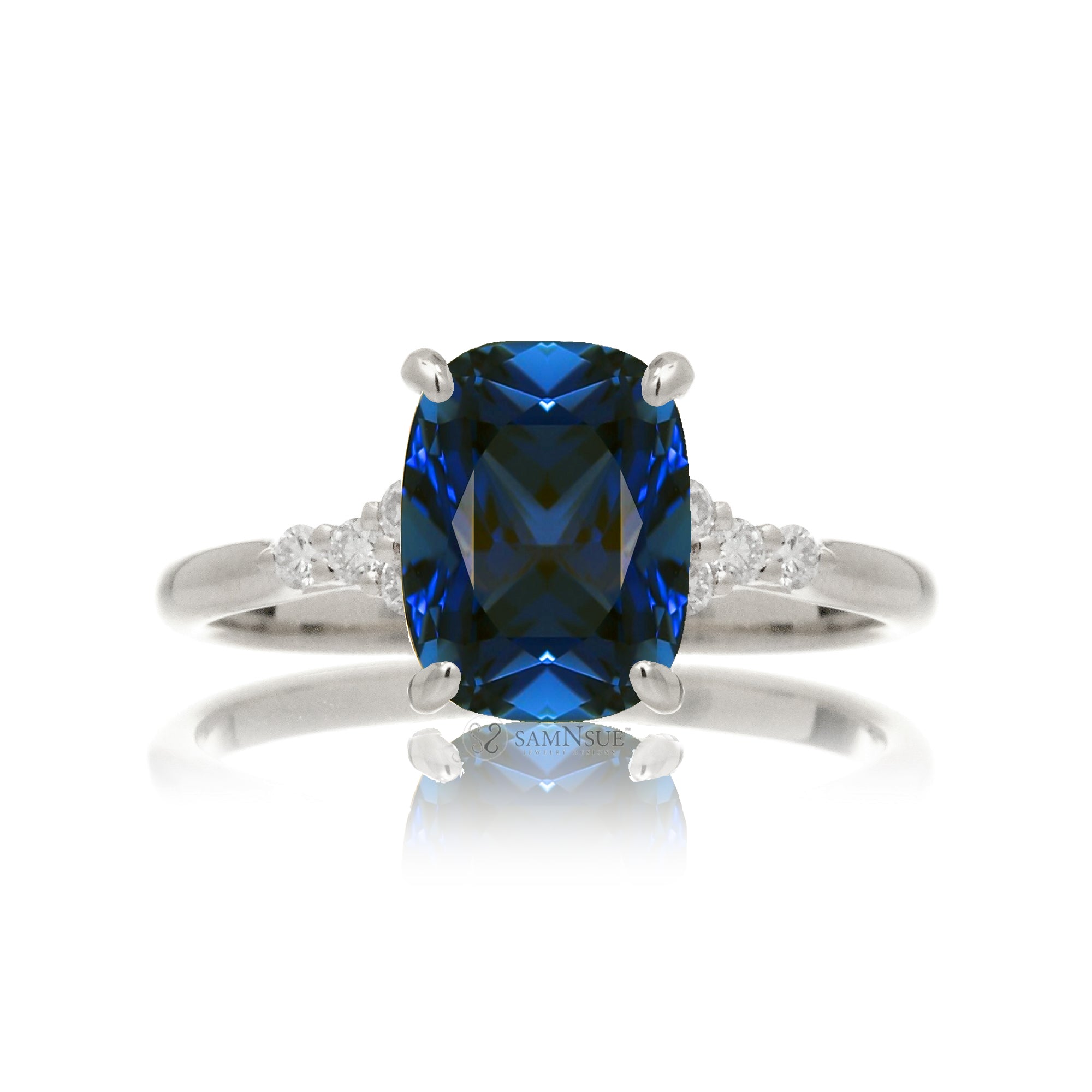 Cushion cut diamond three stone ring white gold